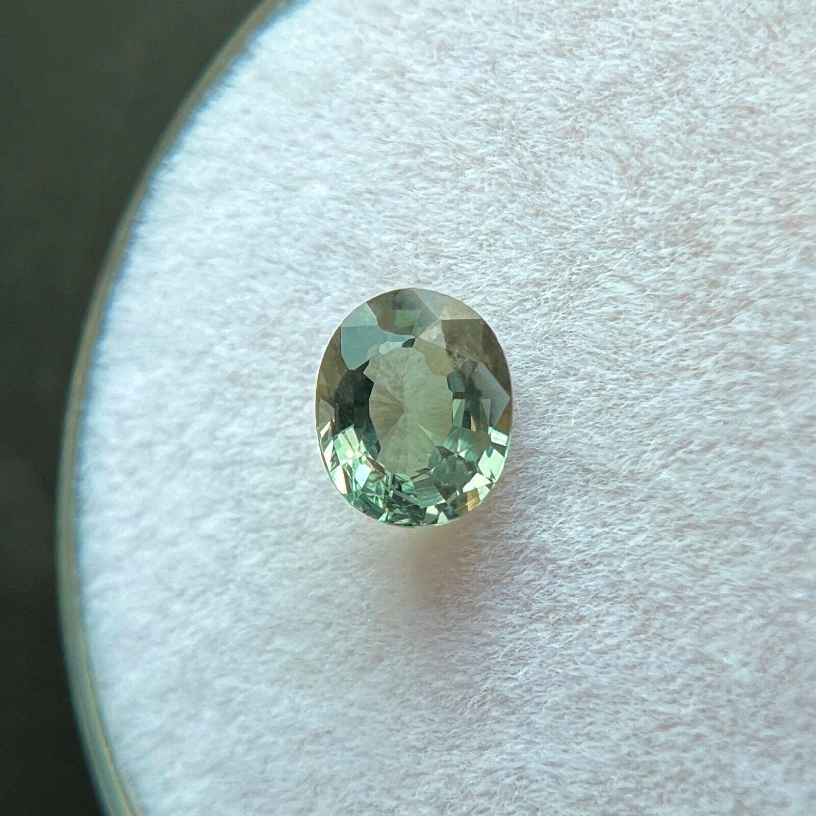 GIA Certificado Raro Natural Cambio de Color Granate 0,57ct Verde Púrpura Gema Talla Ovalada en venta 3