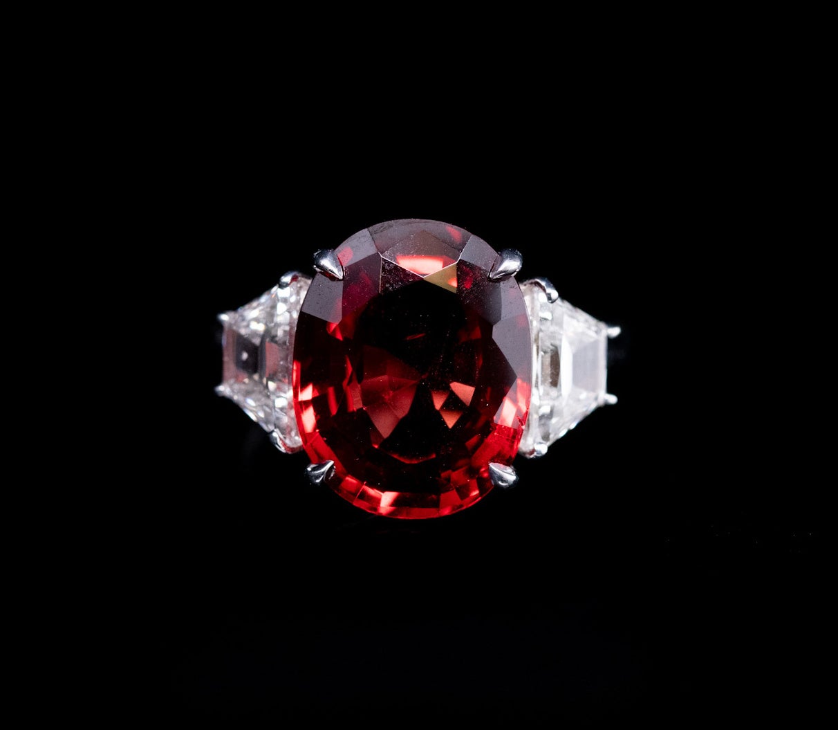 This beautiful, Large and rare Red Spinel is set in a platinum ring with 
2 side diamonds = 1.34cttw
This Red Spinel is GIA certified #5191073660



