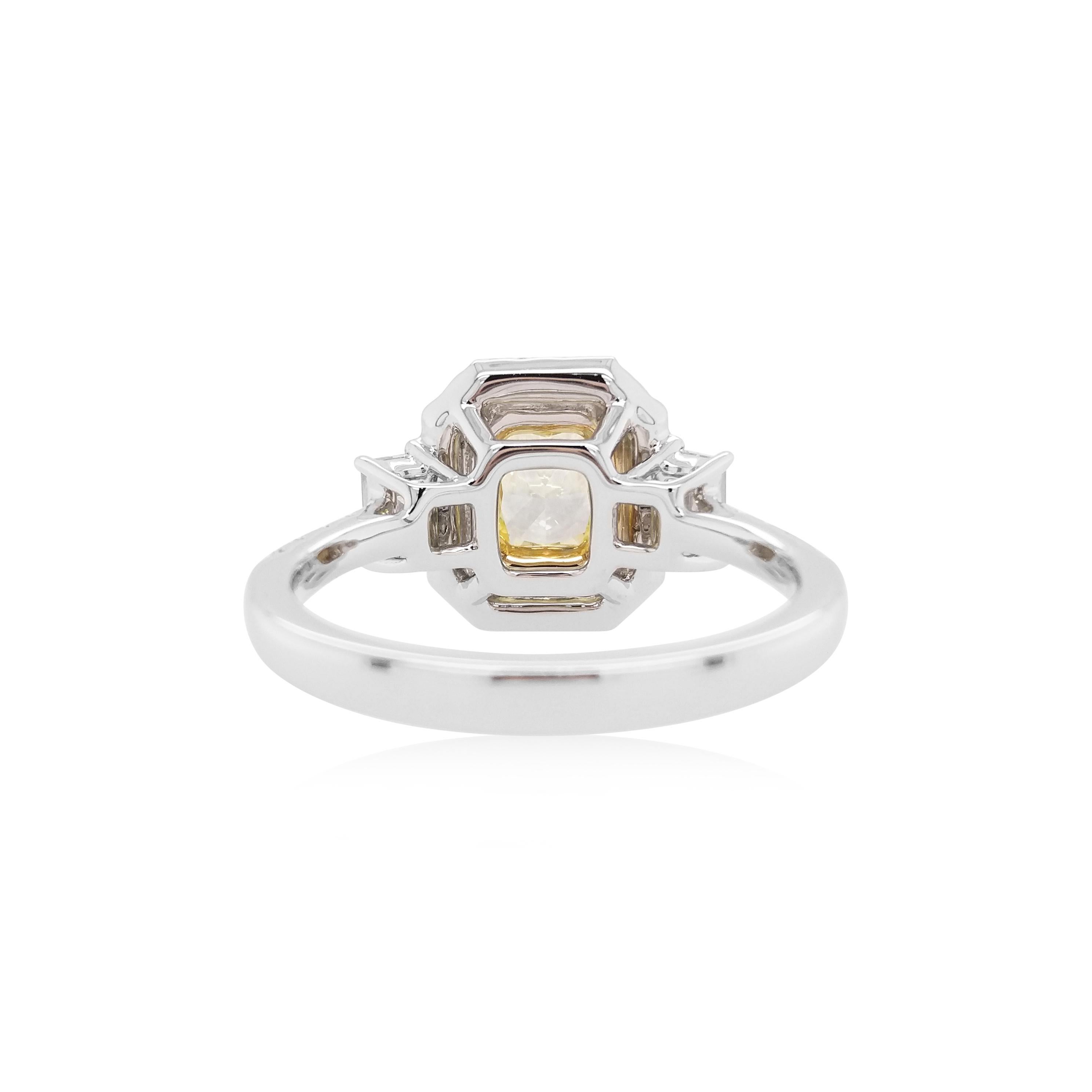 Classic design with Natural Fancy Yellow diamonds with emerald-cut White diamonds and round brilliant cut White and Yellow diamonds.

GIA Certified Fancy Yellow Diamond-0.57 ct
Round Brilliant Cut Yellow Diamond-0.12 ct
White Diamond – 0.73 ct

HYT