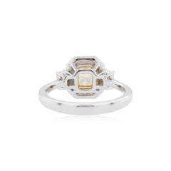 GIA certified Rectangle cut Natural Fancy Yellow Diamond and White Diamond ring