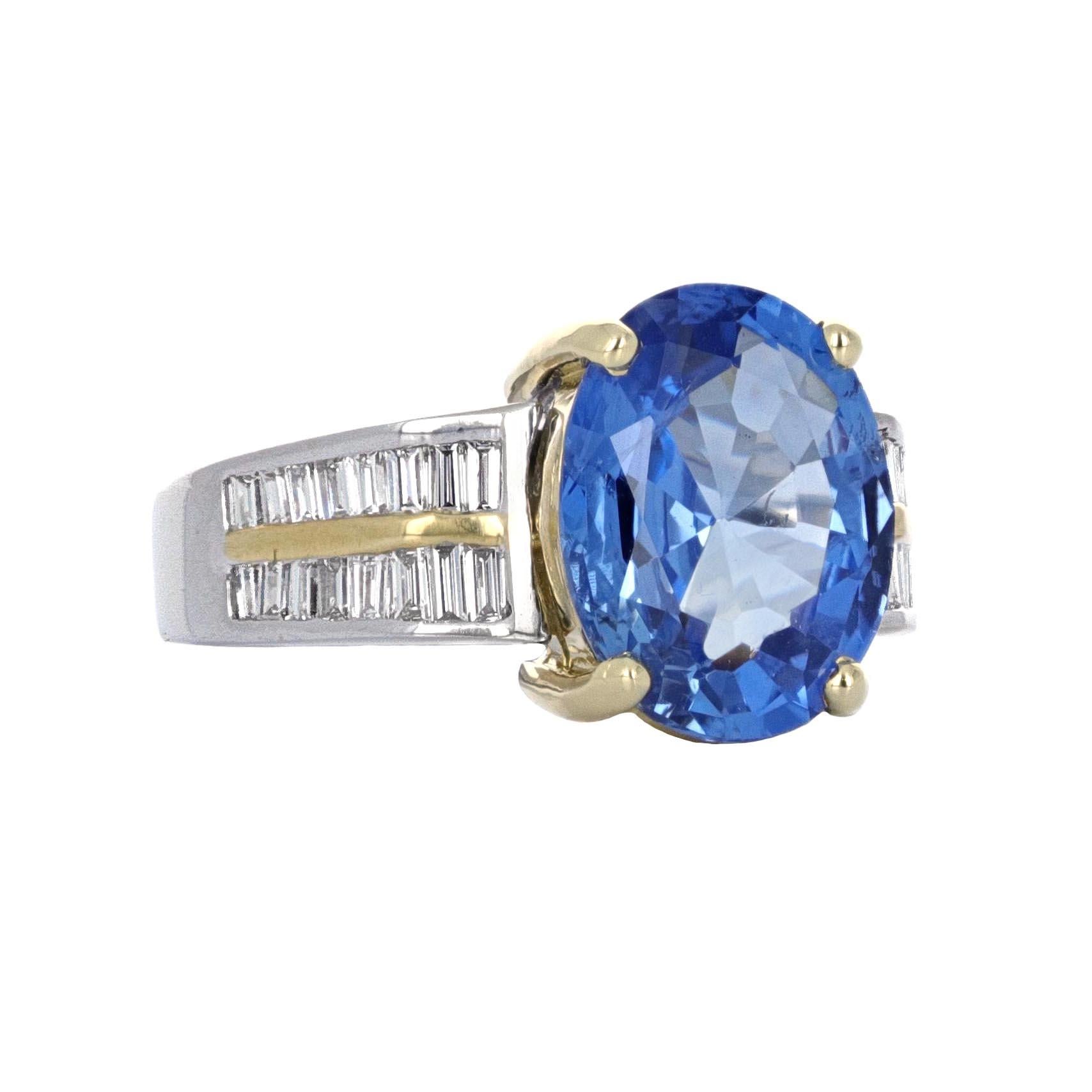 GIA certified 5.08 carat, sapphire and diamond 18 kartat cocktail ring. The ring is crafted in 18 karat white gold and 18 karat yellow gold. 
The GIA describes the stone as a natural oval shaped blue sapphire. It weighs 5.08 carats and measures