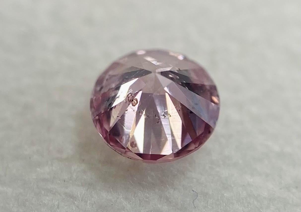 Kindly Notice: This loose stone is not mounted to any jewelry item.
Currently do not have the original Argyle report, it can be authenticate / verified at Argyle Pink diamond website.

GIA Report #1152338396

Argyle Report #85930

GIA Certified