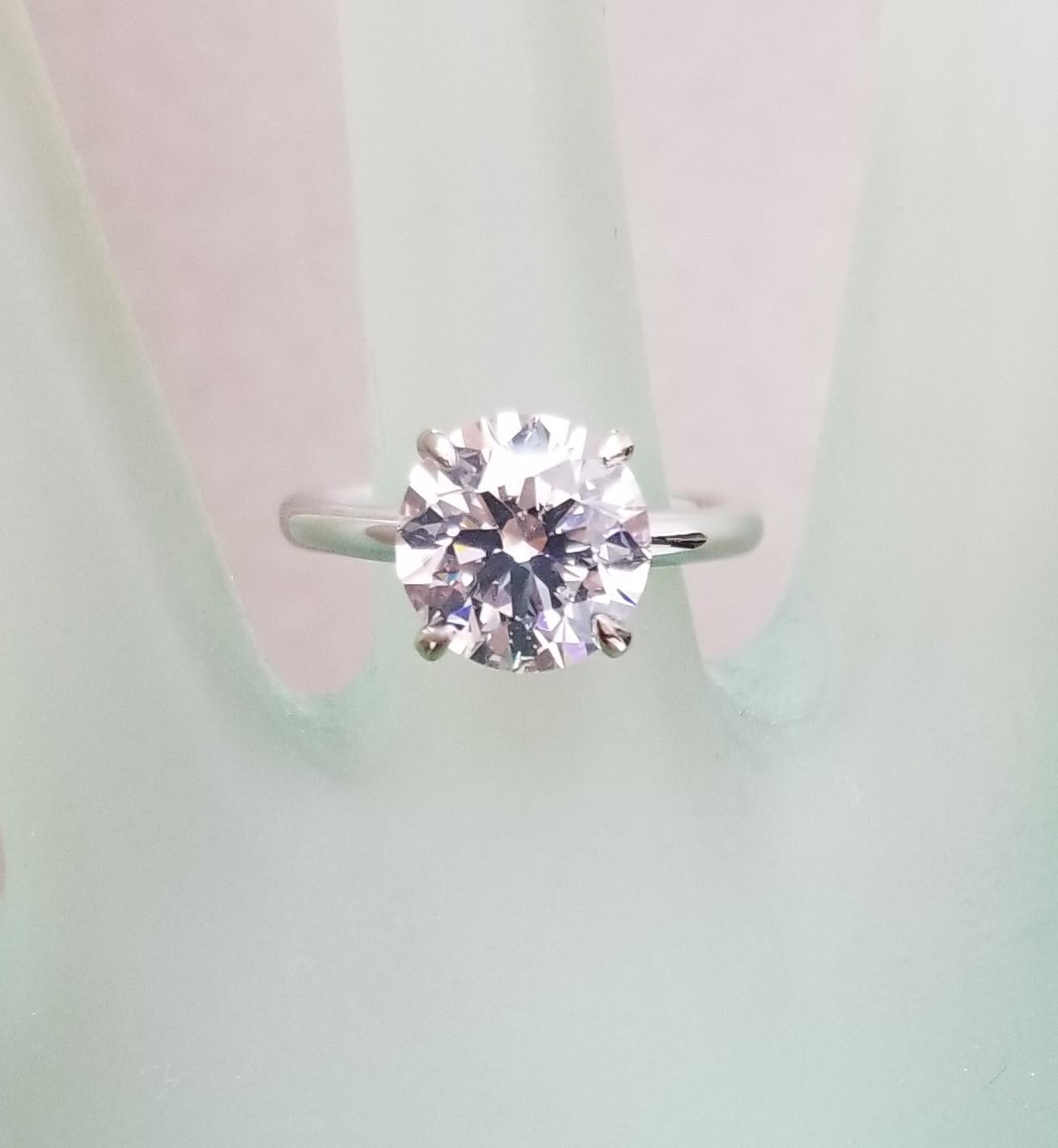 GIA Certified Round 3.60 carat K SI1  Solitaire set in 14k white gold, gorgeous ring sized to fit.  The diamond is a very good K SI1, it shows very well.