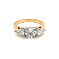 GIA Certified Round and Pear Diamond Ring in 18 Karat Yellow Gold and Platinum