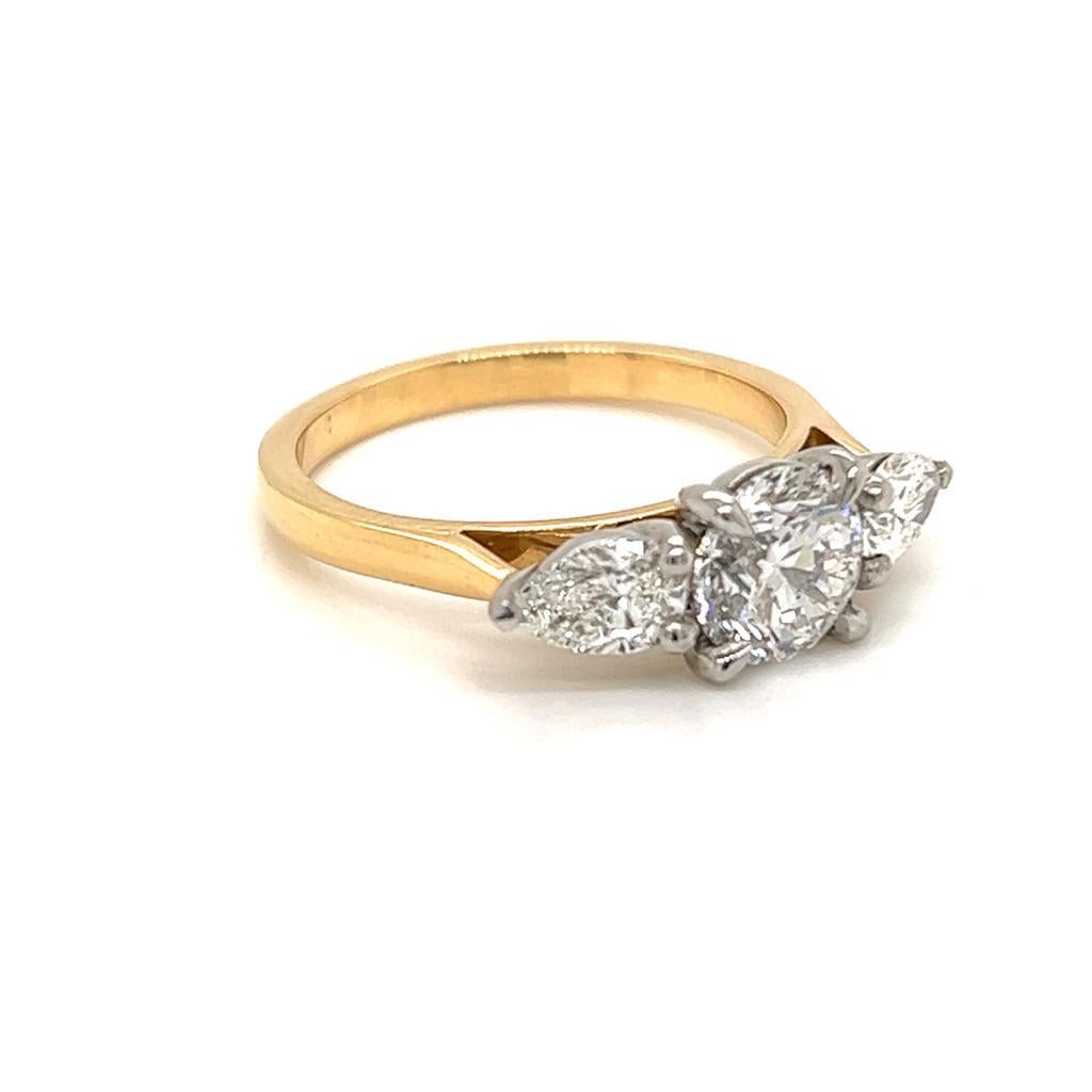 Contemporary GIA Certified Round and Pear Diamond Ring in 18 Karat Yellow Gold and Platinum For Sale
