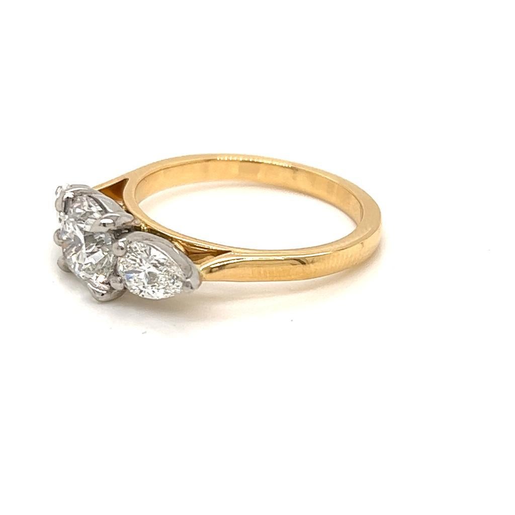 Round Cut GIA Certified Round and Pear Diamond Ring in 18 Karat Yellow Gold and Platinum For Sale