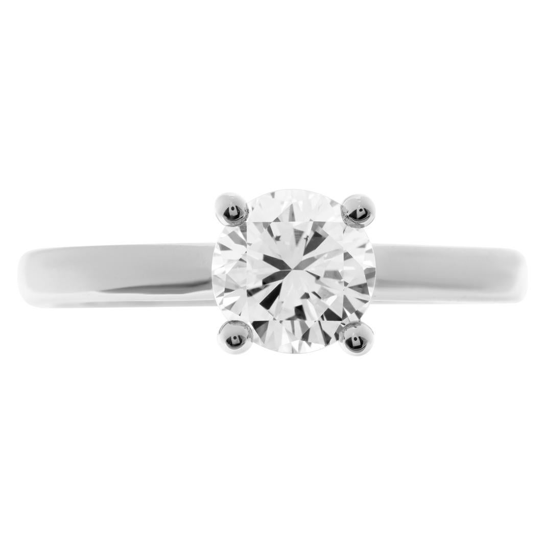 GIA certified round brilliant cut diamond 1 carat (J color, VS1 clarity) ring set in 18k white gold 4 prong setting. Size 7  This Diamond ring is currently size 7 and some items can be sized up or down, please ask! It weighs 3.8 pennyweights and is
