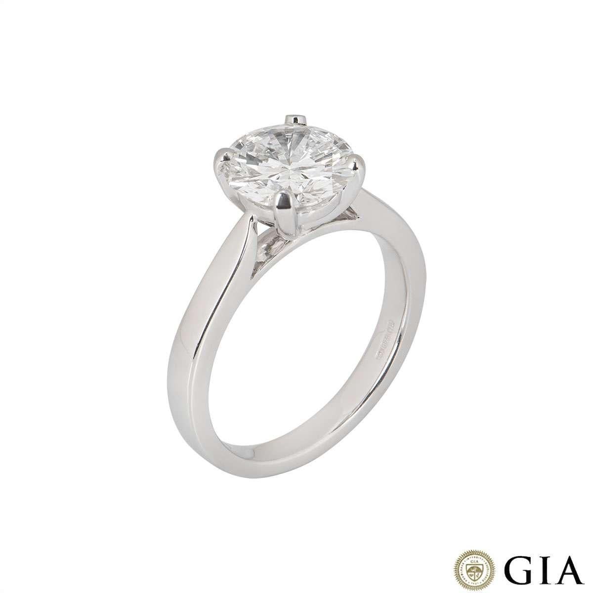 A beautiful 18k white gold diamond engagement ring. The central round brilliant cut diamond weighs 2.08ct, is E colour and VVS2 in clarity. The ring is currently a size UK M½/US 6.25/EU 53 but can be adjusted for a perfect fit. The ring has a gross