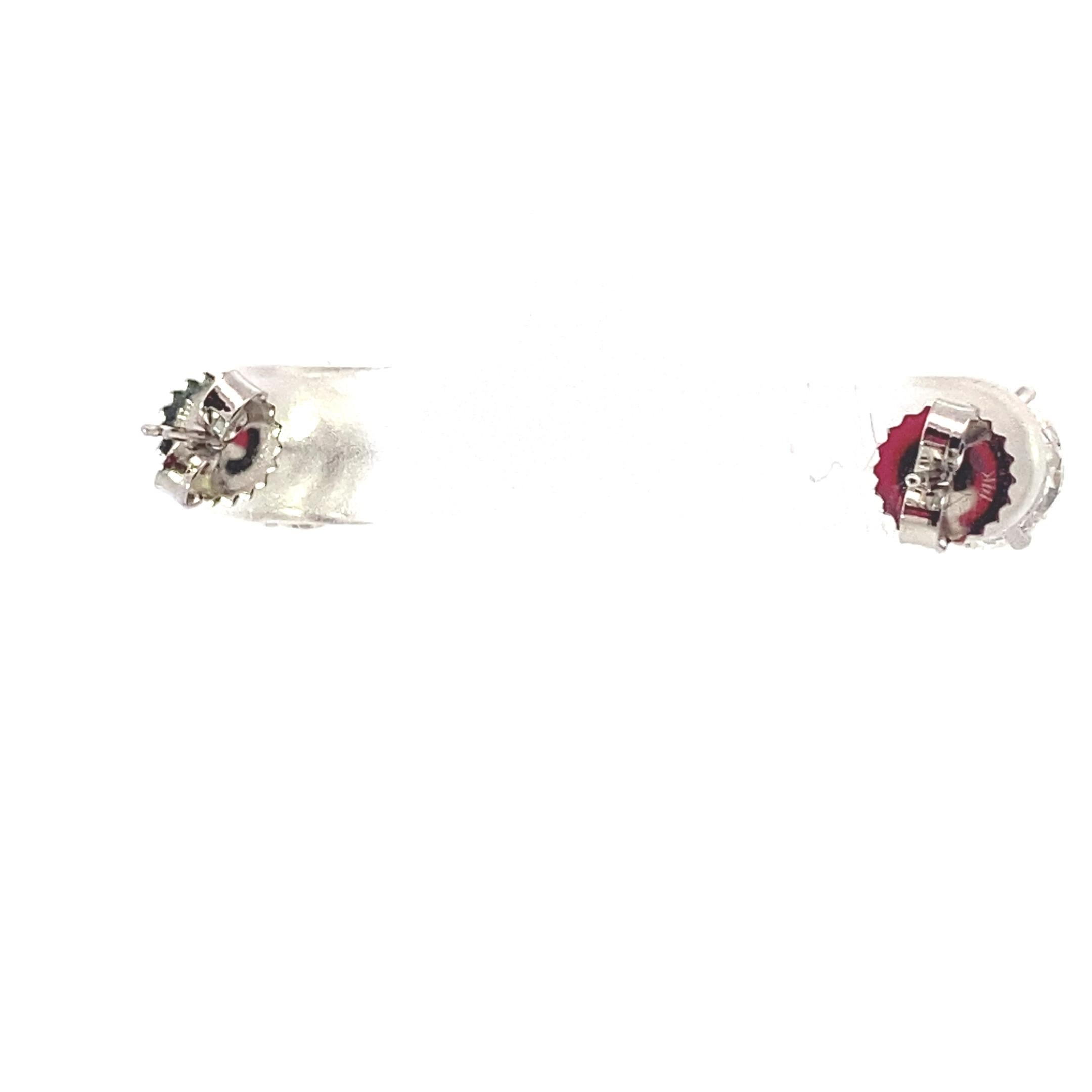 Women's or Men's GIA certified Round brilliant cut Diamond Stud earrings weighing 4.12 ctw. For Sale