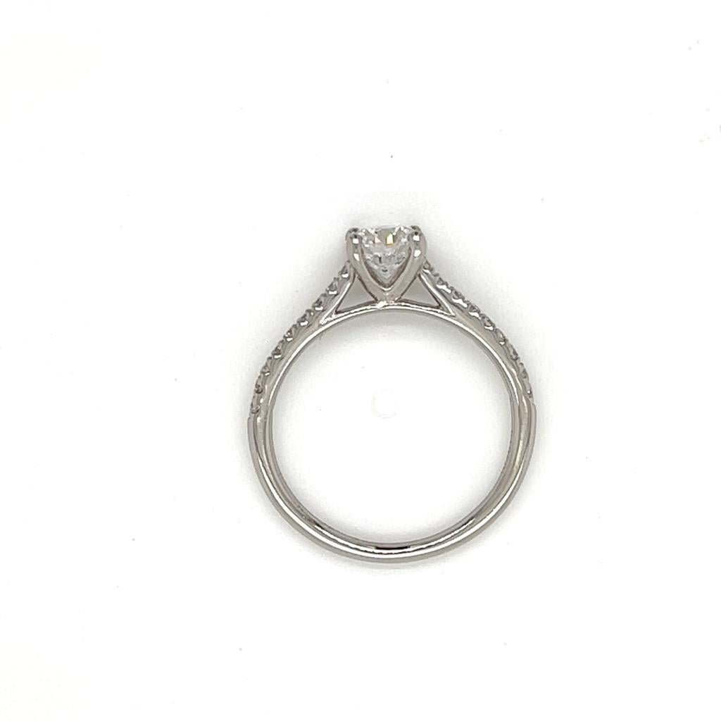 For Sale:  GIA Certified Round Brilliant Diamond Ring with Shoulder Diamonds in Platinum 7