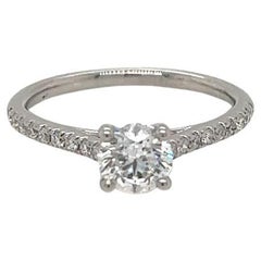 GIA Certified Round Brilliant Diamond Ring with Shoulder Diamonds in Platinum