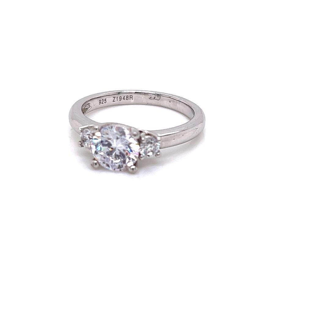 For Sale:  GIA Certified Round Brilliant Diamond Three-Stone Ring in Platinum 2
