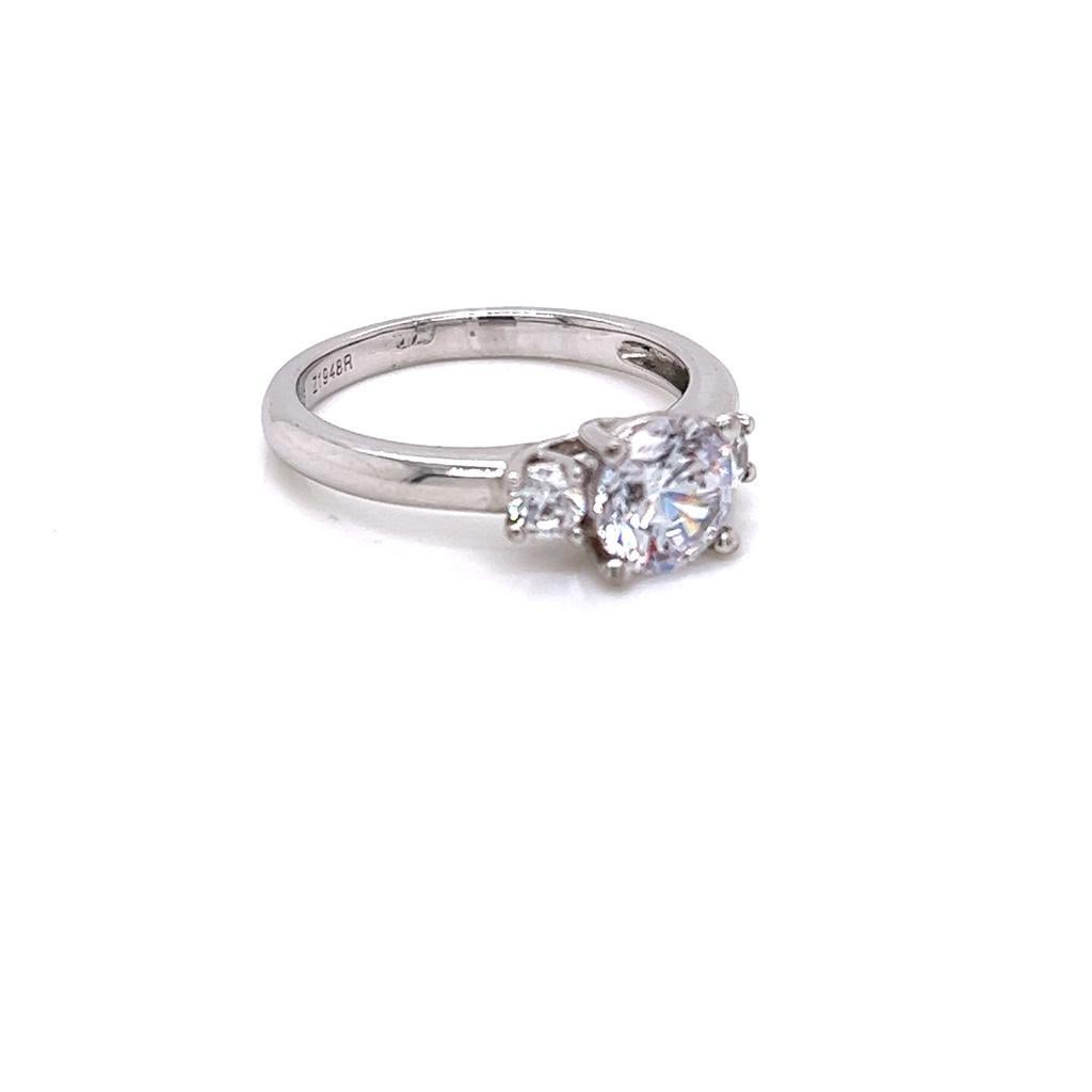 For Sale:  GIA Certified Round Brilliant Diamond Three-Stone Ring in Platinum 3