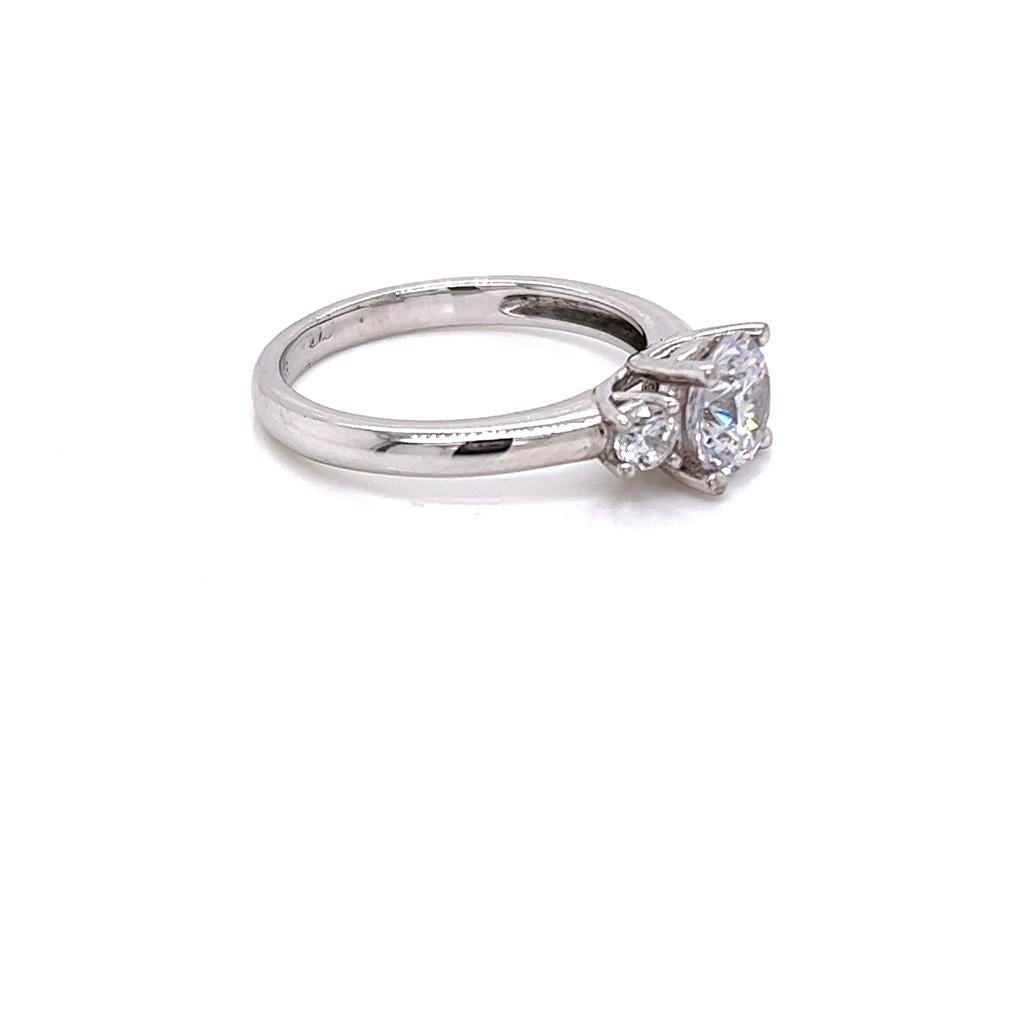 For Sale:  GIA Certified Round Brilliant Diamond Three-Stone Ring in Platinum 5