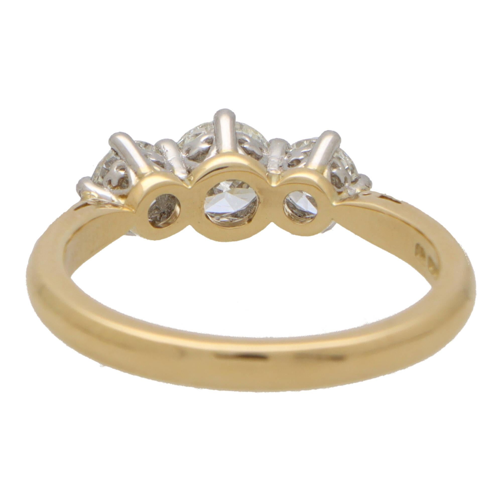 Round Cut GIA Certified Round Brilliant Diamond Three Stone Ring Set in 18k Yellow Gold