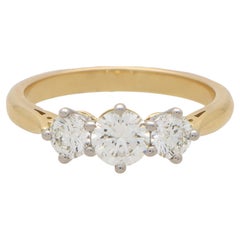 GIA Certified Round Brilliant Diamond Three Stone Ring Set in 18k Yellow Gold