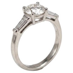 GIA Certified Round Diamond and Tapered Baguette Engagement Ring