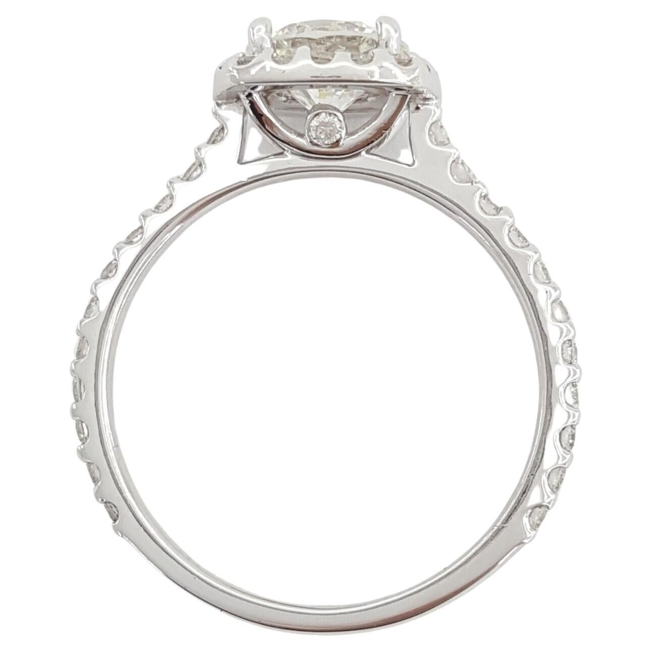  1.53 ct total weight Round Brilliant Cut Diamond Halo 18k White Gold Engagement Ring GIA.



The ring weighs 3.1 grams, size 6.25, the center stone is a Natural  0.98 ct Round Brilliant Cut Diamond, G in color, SI1 in clarity.

This diamond looks