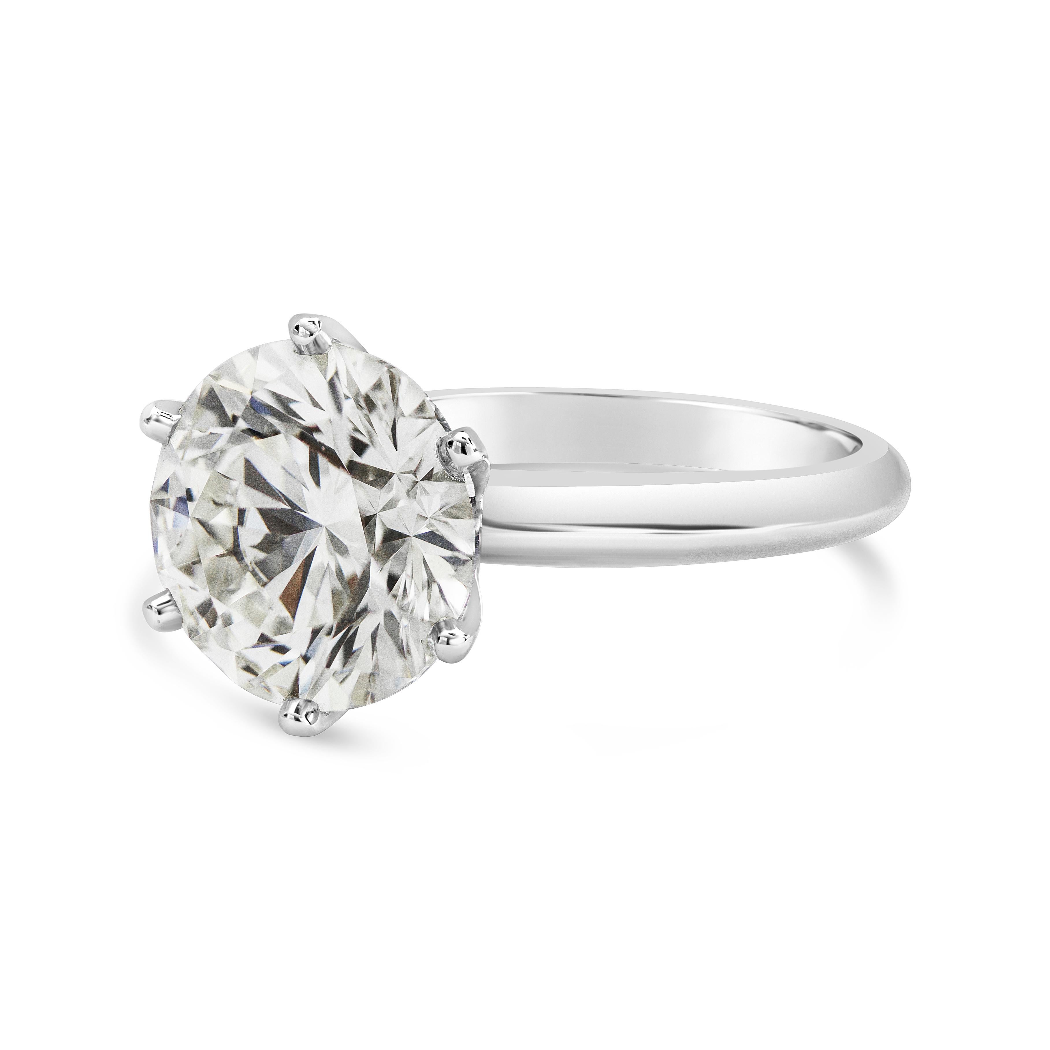 Showcasing a single 5.03 carat round brilliant diamond set in a 6 prong, knife-edge platinum band. GIA certified the diamond as J color, SI1 clarity; Excellent in Cut, Polish, and Symmetry.

Style available in different price ranges. Prices are