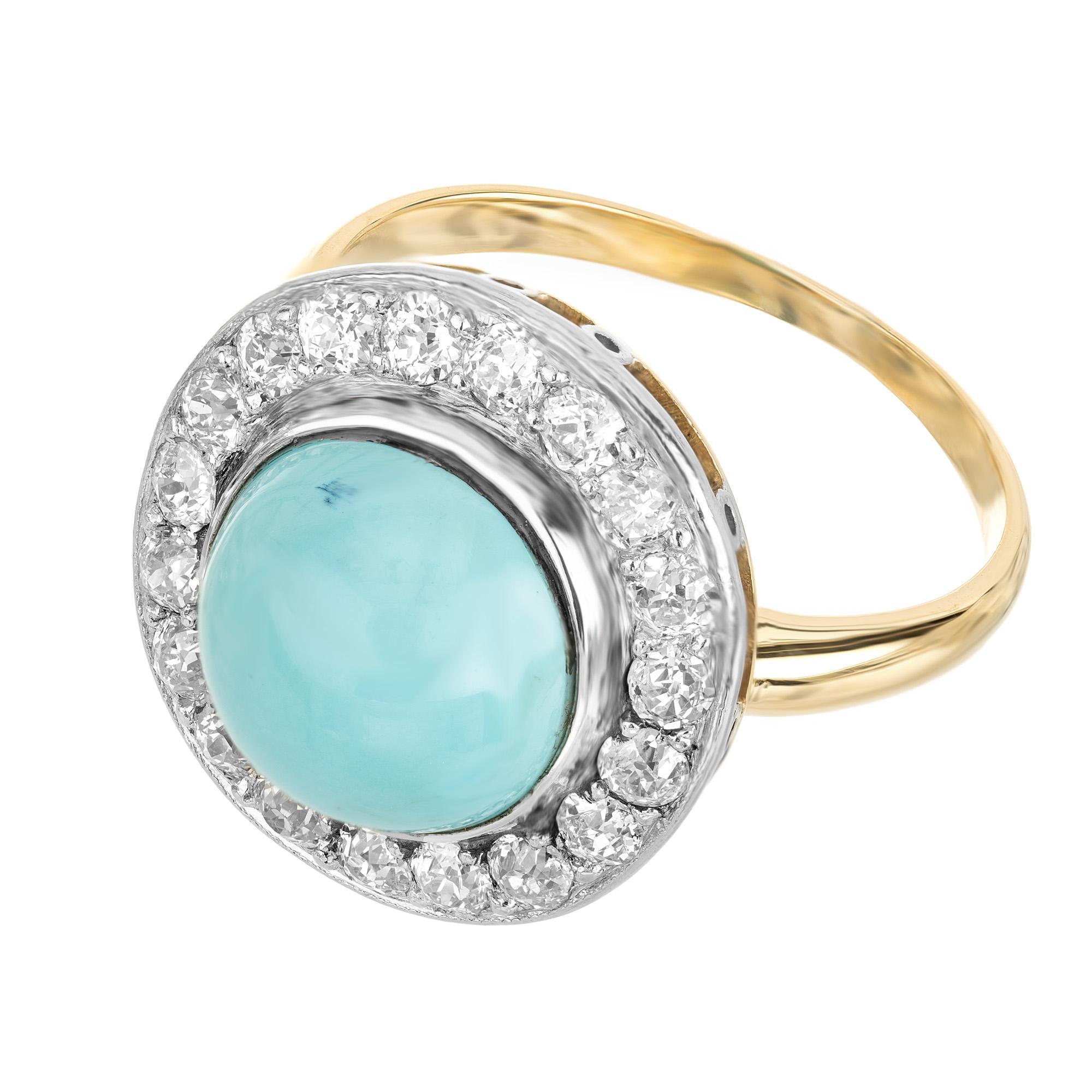 Natural, untreated Persian blue GIA certified Turquoise round cabochon ring circa 1930's. Bright shiny high dome Turquoise surrounded by bright sparkly old European cut Diamonds in a handmade 14k yellow gold ring with platinum halo top. This