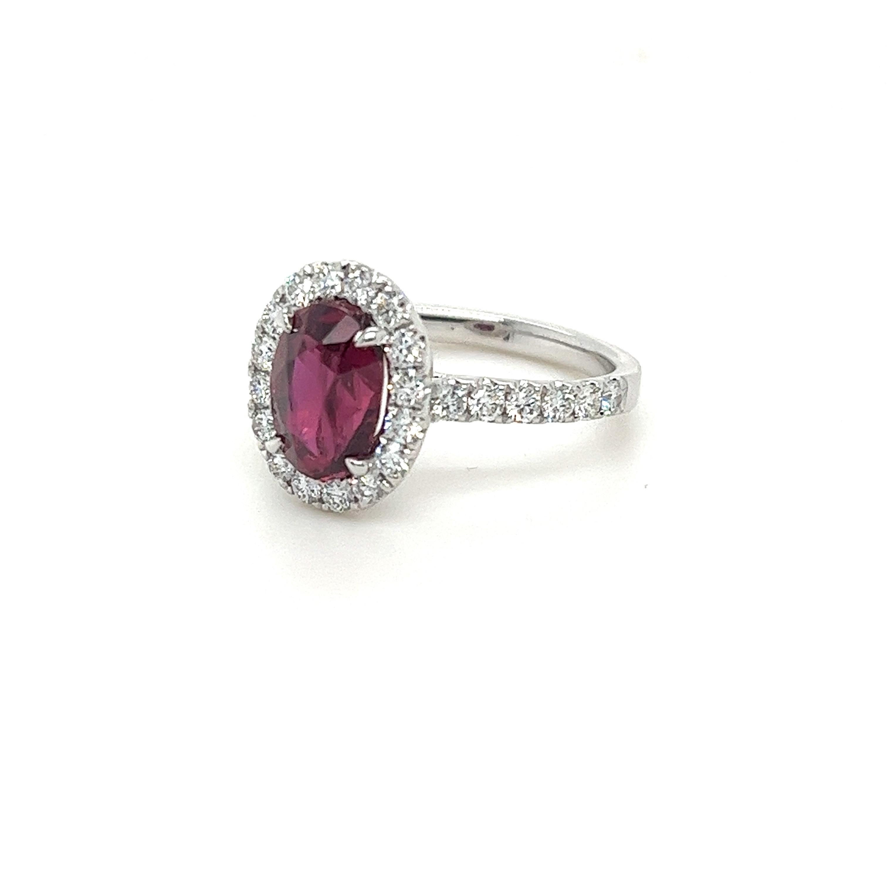 GIA certified Oval Ruby weighing 2.96 carats
Measuring ( 9.29x6.56x5.67) mm
Diamonds weighing .75 carats
G-SI1
Set in 18k white gold ring
3.66 g