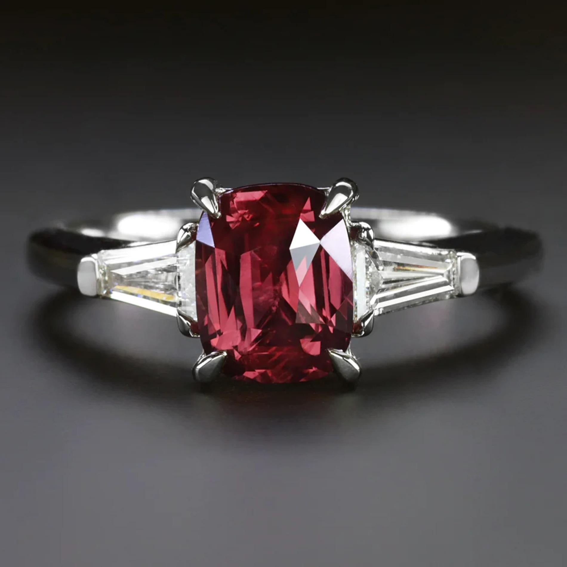 This ruby and diamond ring features a rich red ruby flanked by a pair of baguette diamonds for a sleek and sophisticated finish.

Highlights:

- 1.77ct natural ruby center with GIA certification

- Very rich red color

- Ruby appears very clean with