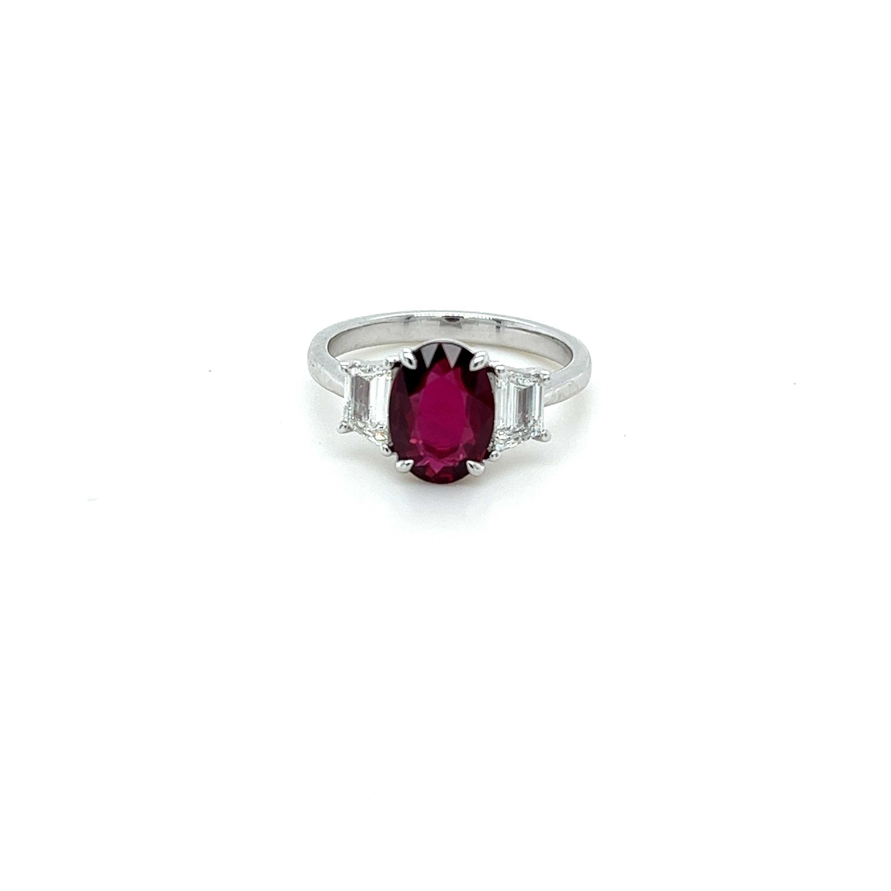 GIA certified oval Ruby weighing 2.08 carats
Measuring (9.53x6.91x3.31) mm
Diamonds weighing .62 carats
H-VS1 quality
Set in platinum ring
5.80 grams