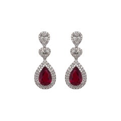 Orecchini pendenti con rubino e doppio diamante aureolato certificati GIA in oro bianco 18 carati