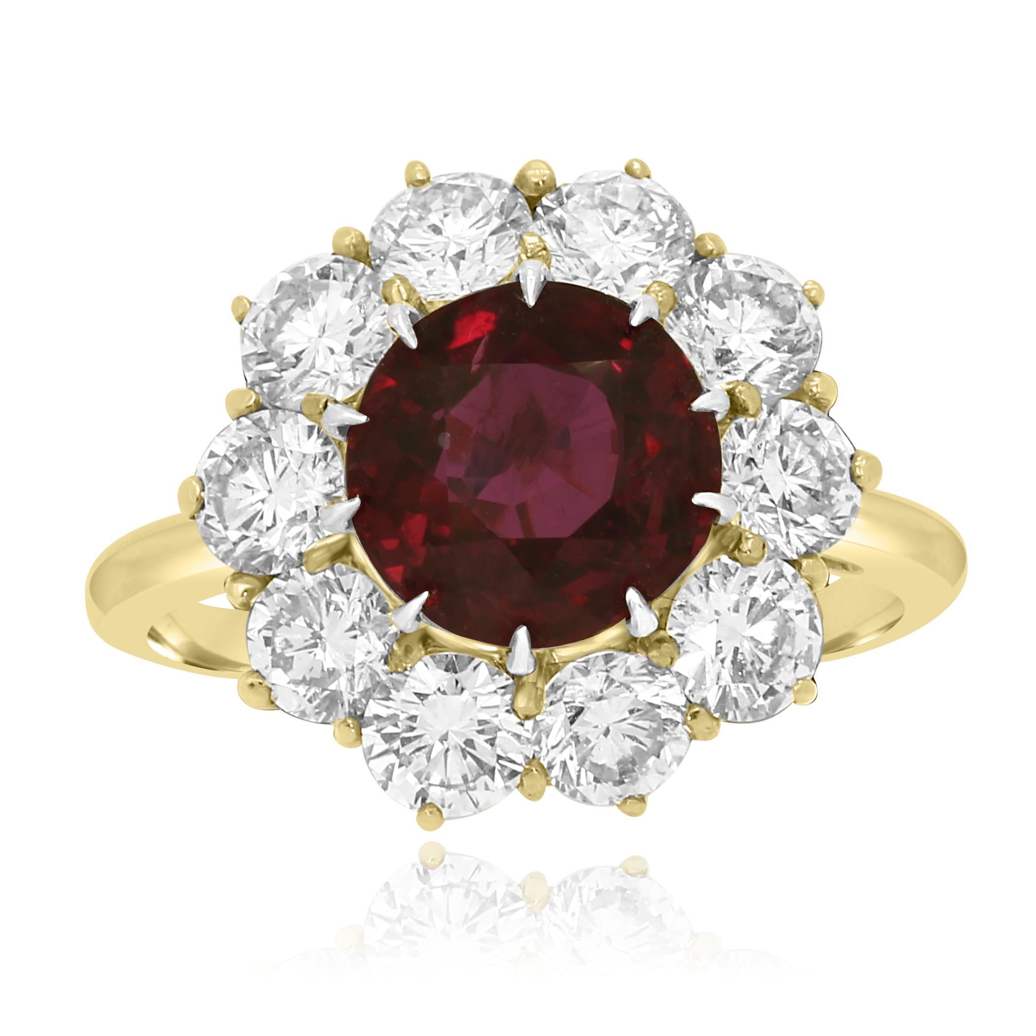 Stunning GIA Certified Thai Ruby Round 3.90 Carat encircled in a single Halo of White Round Diamonds approximately 3.00 Carats in 14K Yellow Gold and Platinum Ring.

Center Ruby Round Weight 3.90 Carat
Total Approximate Weight 6.90 Carat

