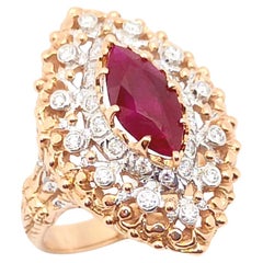 Anello con rubino sangue di piccione certificato GIA e diamanti in oro rosa 18 carati