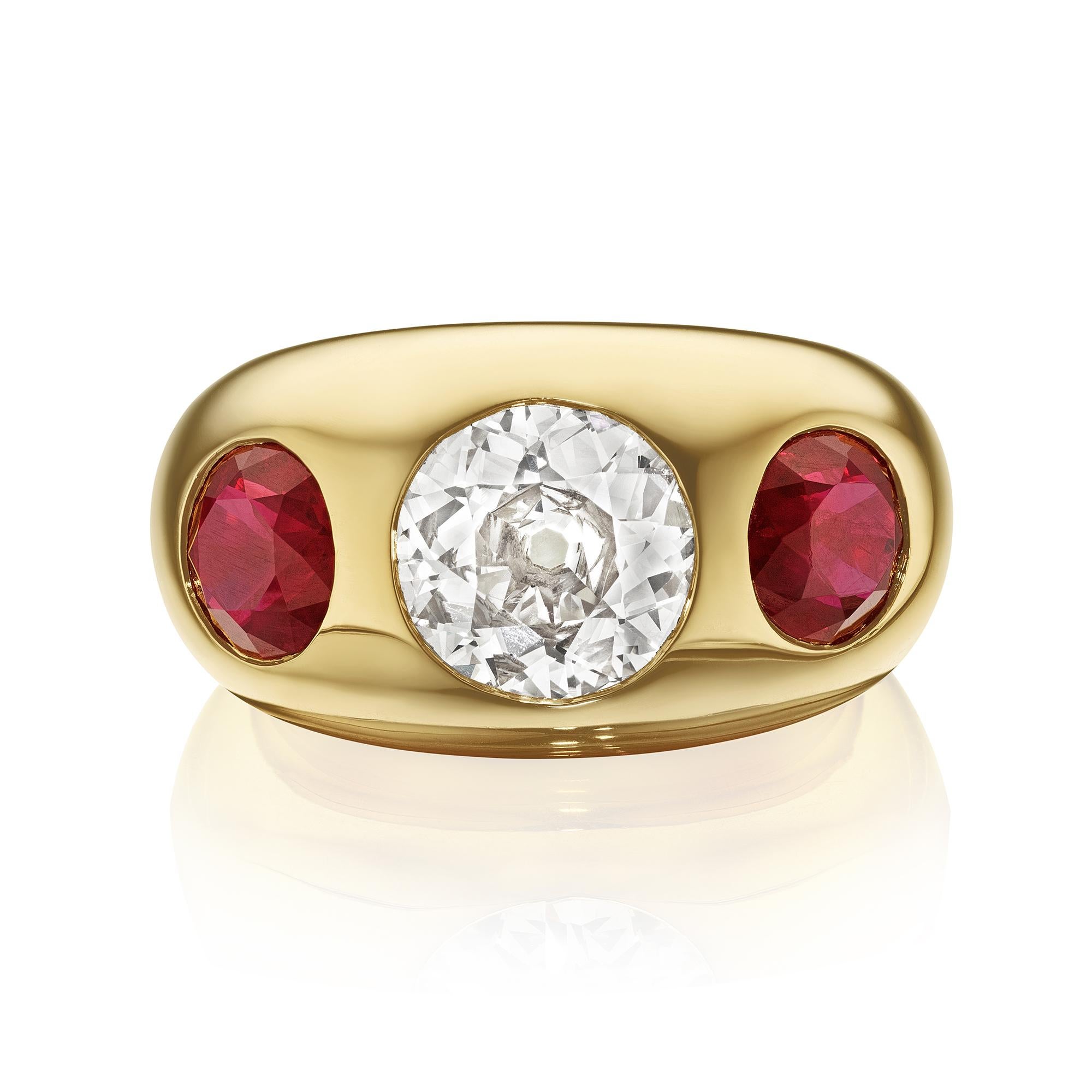 Gold Diamond and Ruby Ring by Siegelson, New York 
A ring composed of a central collet-set diamond sided by rubies; mounted in 18-karat gold
• 1 diamond; total weighing 1.79 carats
• 2 rubies; total weighing 2.59 carats
• Measurements: 7/8 x 15/18 x
