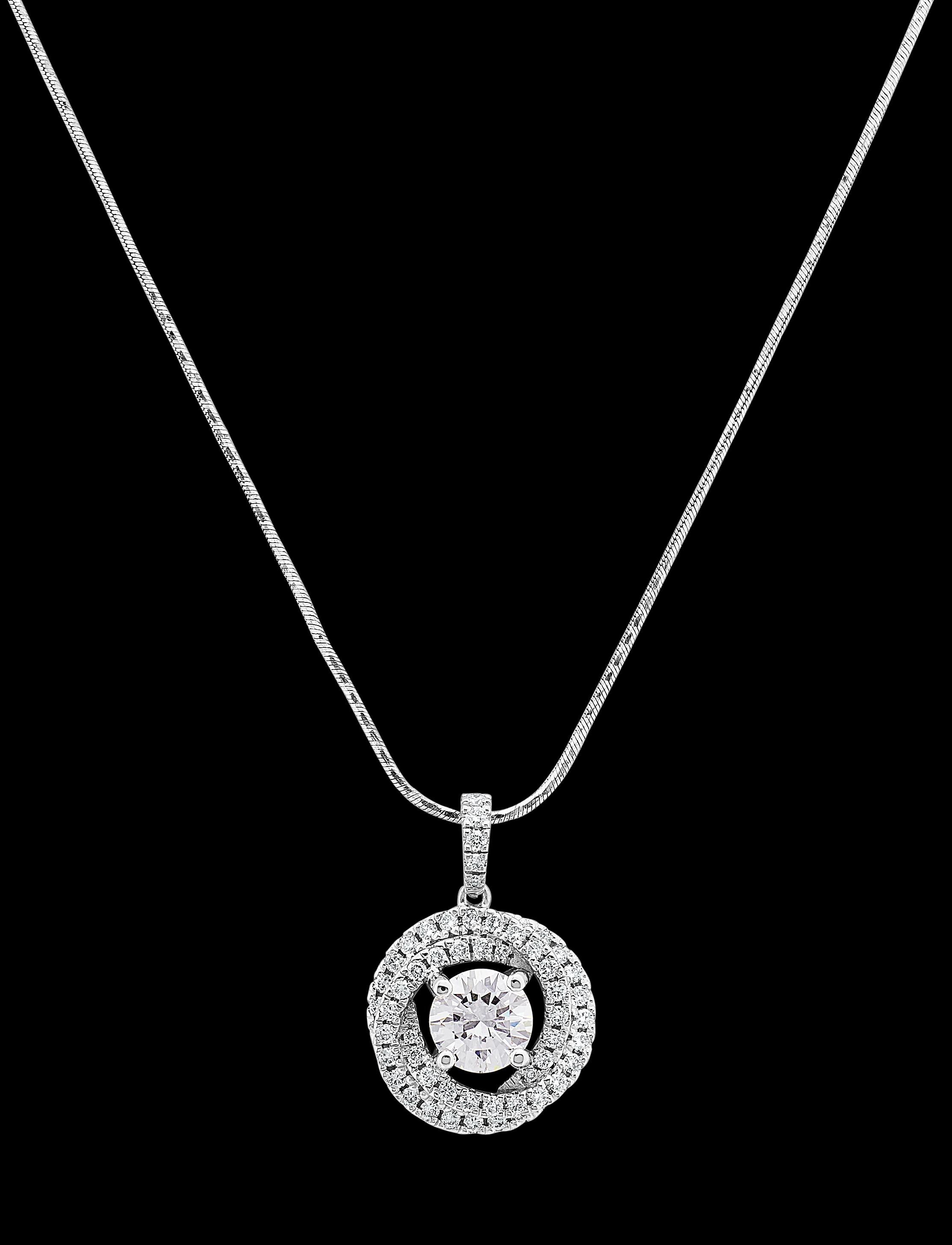 Modern GIA certified 1.6ct D VS1 Single Stone Round Diamond Trinity Pendant Platinum For Sale