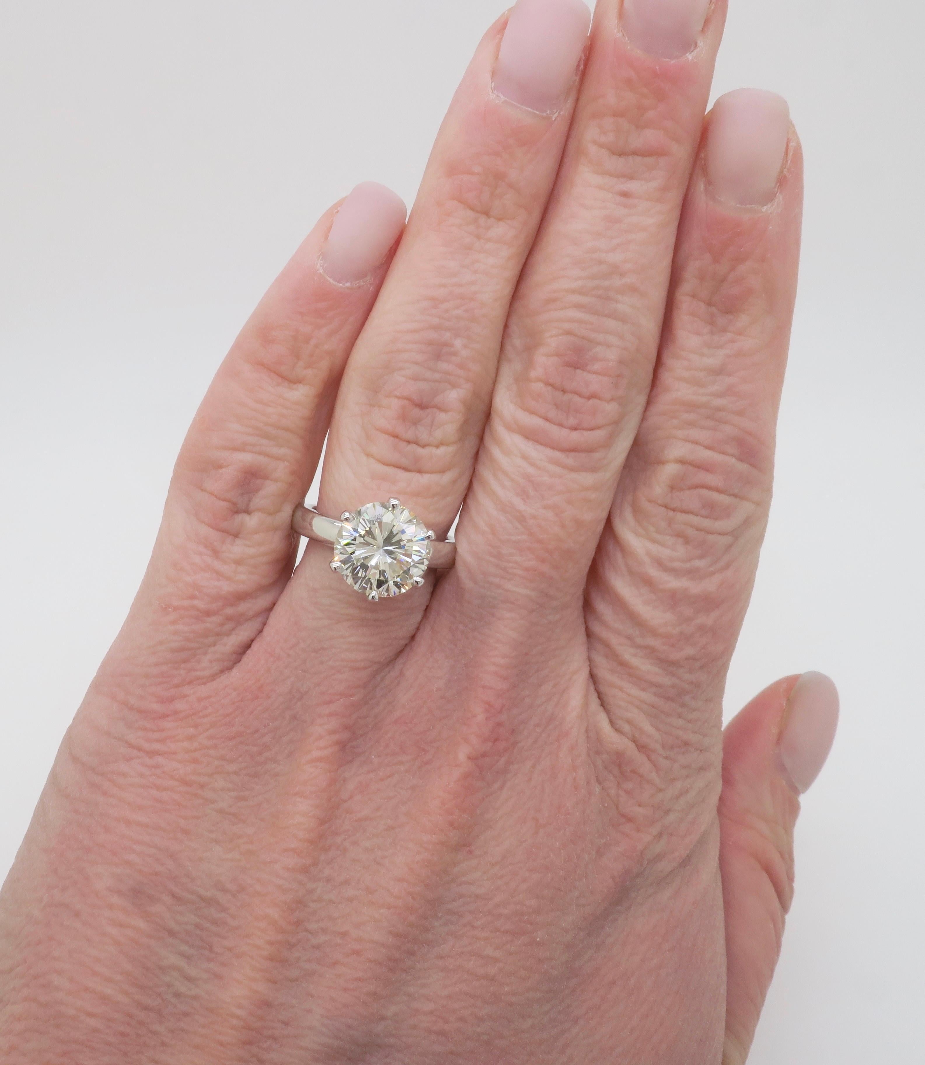 Classic GIA certified six prong diamond engagement ring made in 14k white gold. 

Diamond Carat Weight: 3.97CT Earth Mined
Diamond Cut: Round Brilliant Cut 
Diamond Color: L
Diamond Clarity: VVS2
Diamond Certification: GIA: 2235187192
Metal: 14k