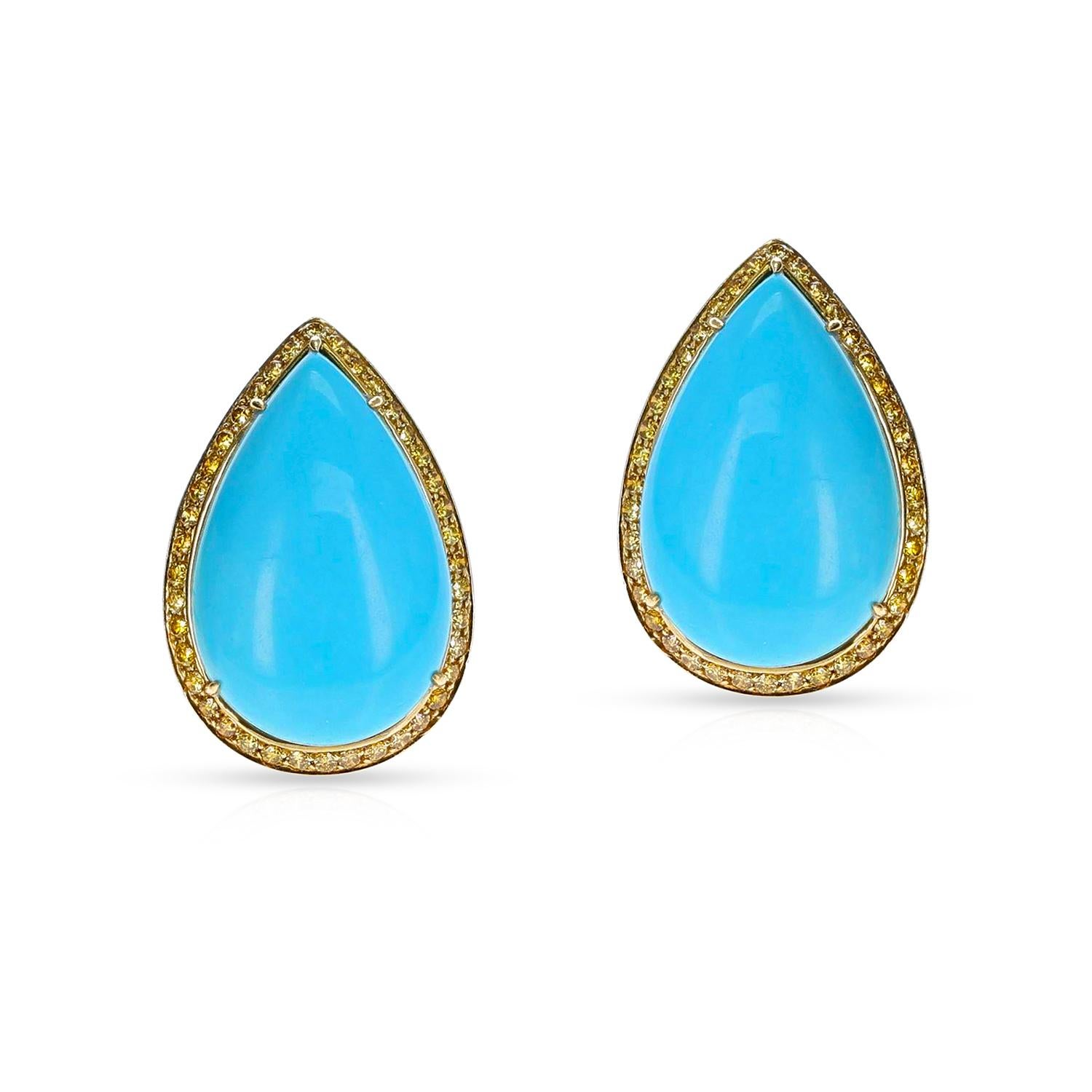 A pair of GIA certified pear-shaped sleeping beauty turquoise cabochons with a border of brilliant-cut diamonds of yellow shade. The diamond weight is appx. 2.55 carats, signed PC, mounted in 18k gold. The total weight is 28.75 grams. Length: 1.29
