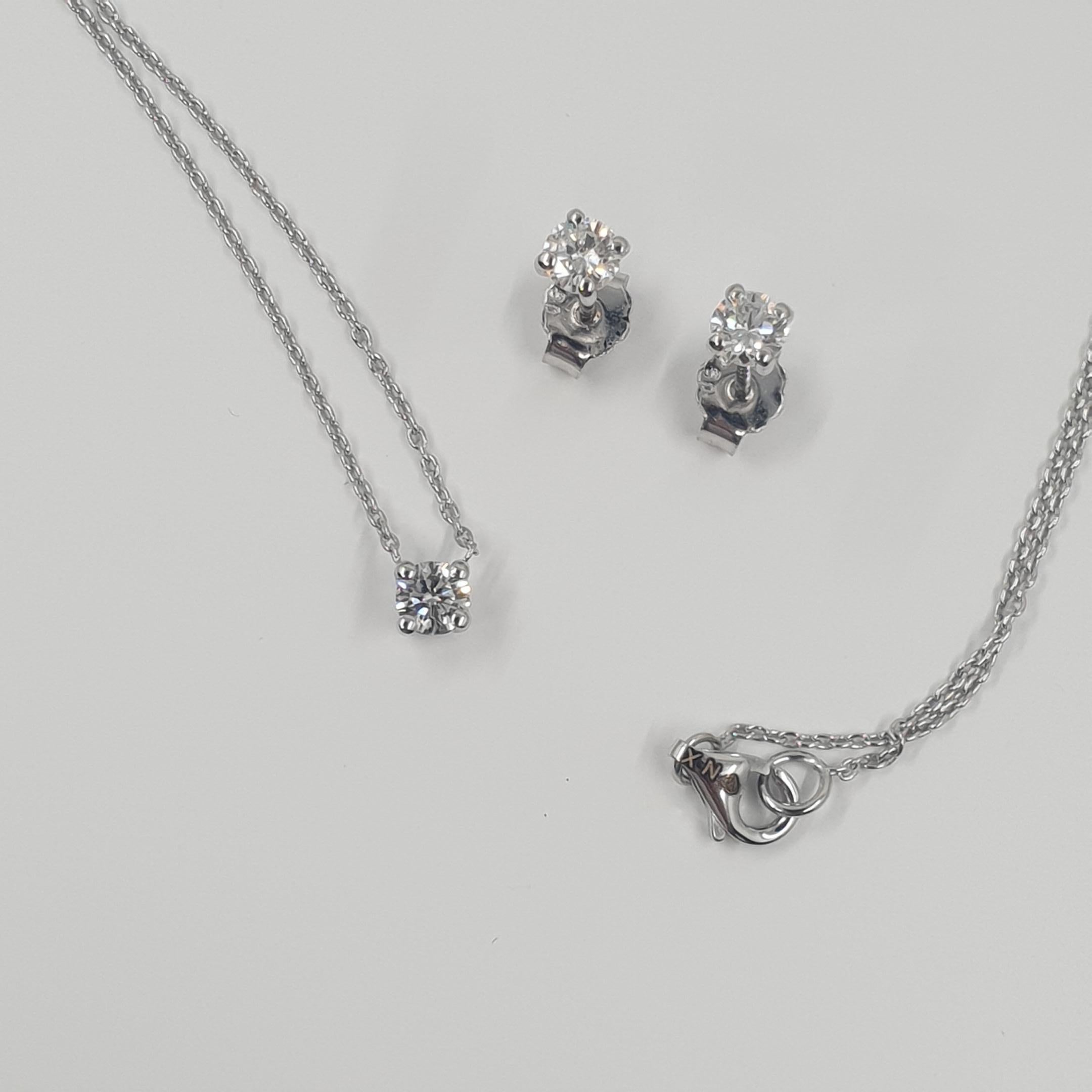 Boucles d'oreilles et collier solitaires en diamants certifiés GIA de 0,63 carat G/SI1 en vente 4