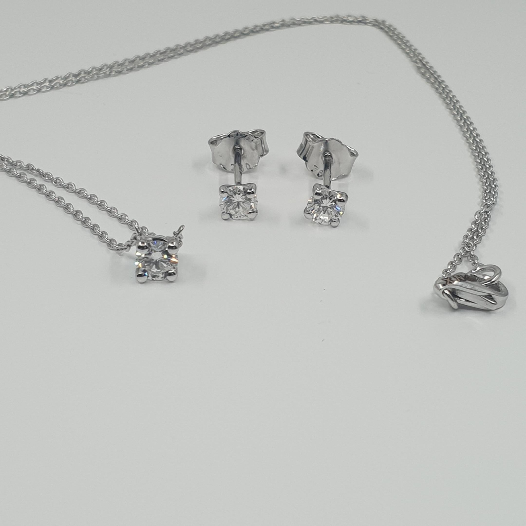 Boucles d'oreilles et collier solitaires en diamants certifiés GIA de 0,63 carat G/SI1 en vente 6