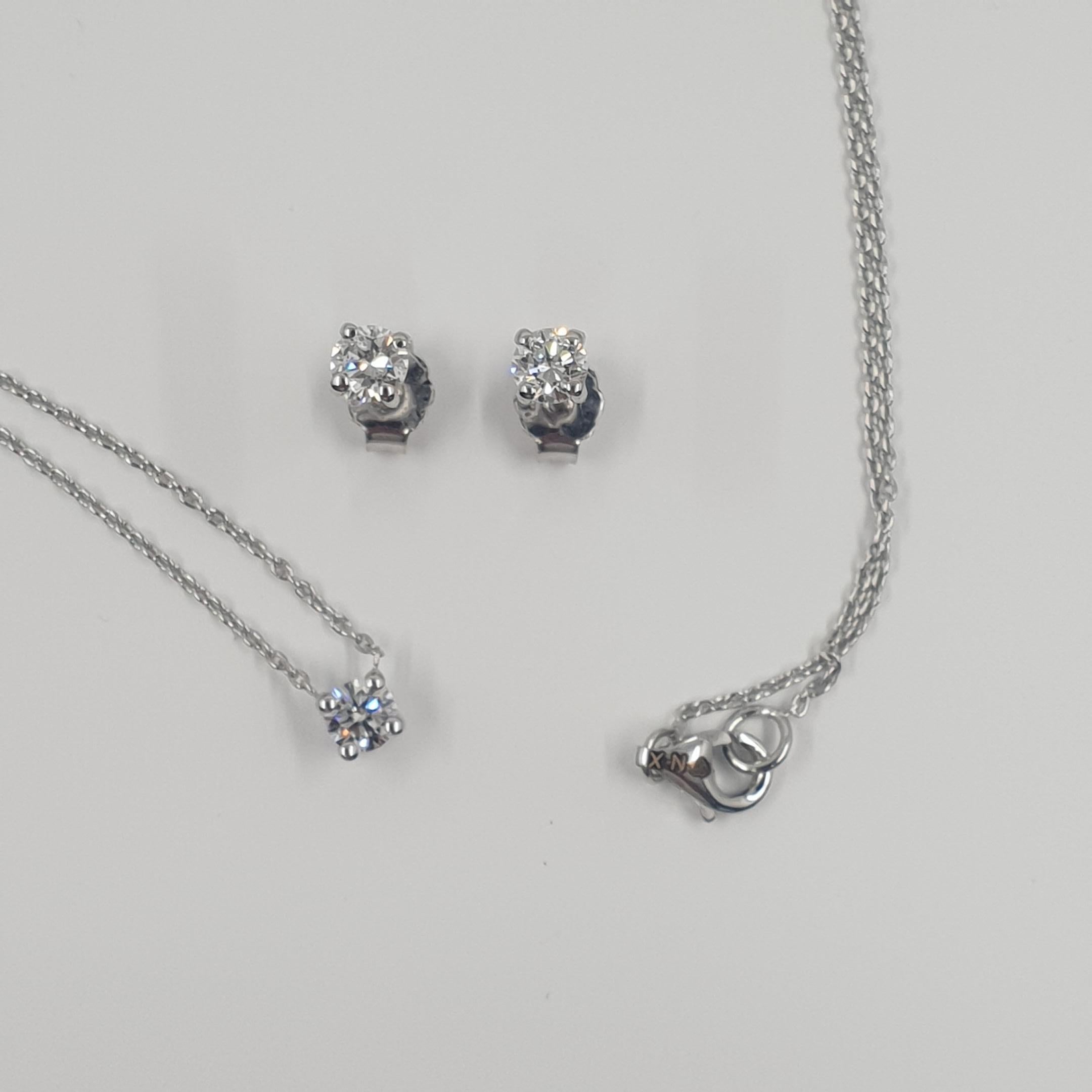 Boucles d'oreilles et collier solitaires en diamants certifiés GIA de 0,63 carat G/SI1 en vente 2