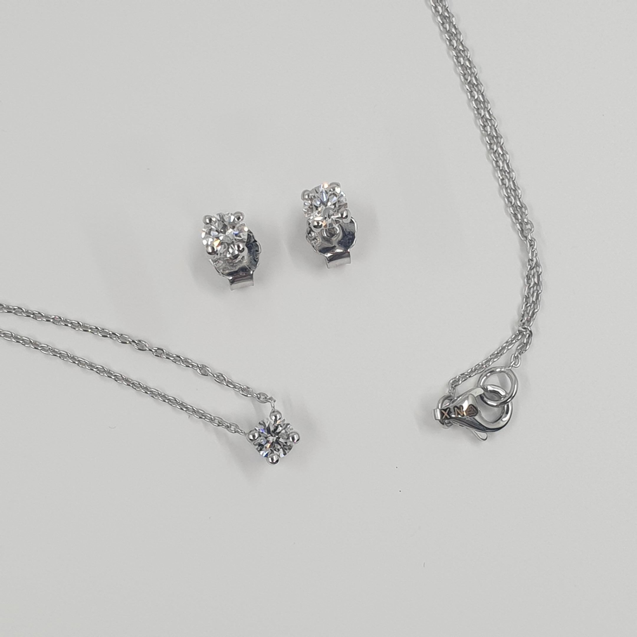 Boucles d'oreilles et collier solitaires en diamants certifiés GIA de 0,63 carat G/SI1 en vente 3