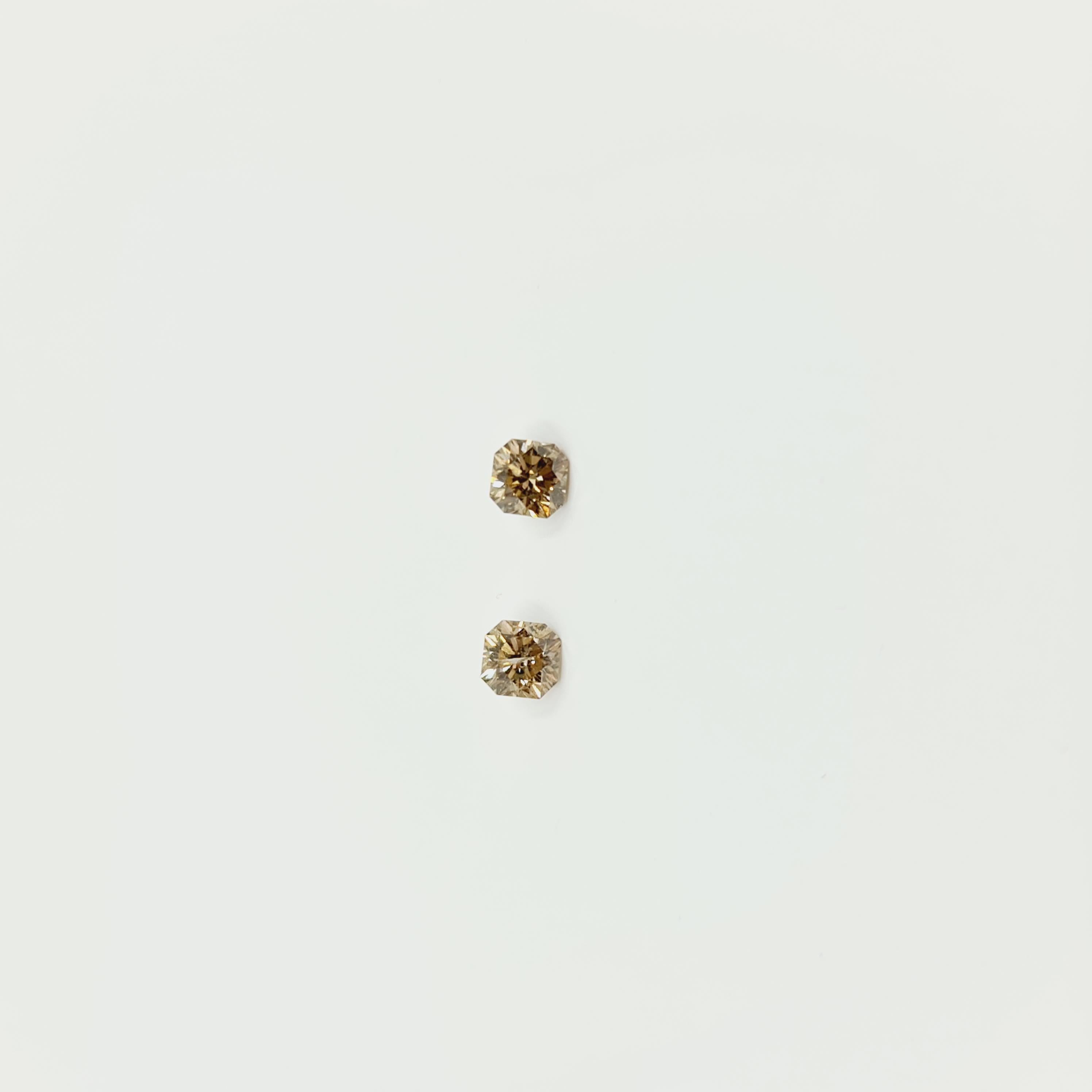 GIA Certified Solitaire Fancy Cognac Diamond Studs 0.45 Carat I2 0.46 Carat I1.
750 Whitegold Solitaire Earrings with Fancy Flanders Cut Diamonds.  
High Gloss Polished.   

Flanders Cut
Also called 