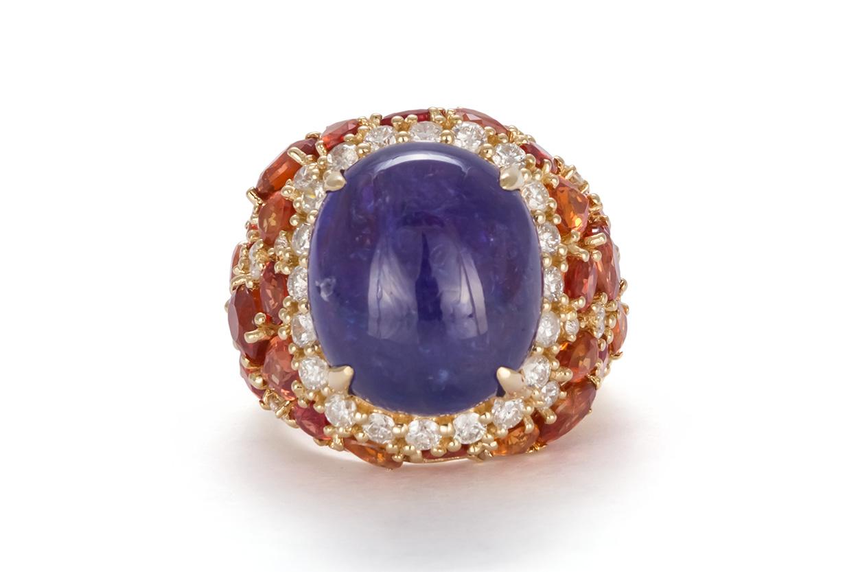 We are pleased to offer this GIA Certified Tanzanite, Citrine & Diamond 18k Yellow Gold Cabochon Cocktail Ring. This stunning ring feature a 17.38ct GIA certified natural Cabochon Cut Tanzanite accented by approximately 2.00ctw beautiful mixed cut