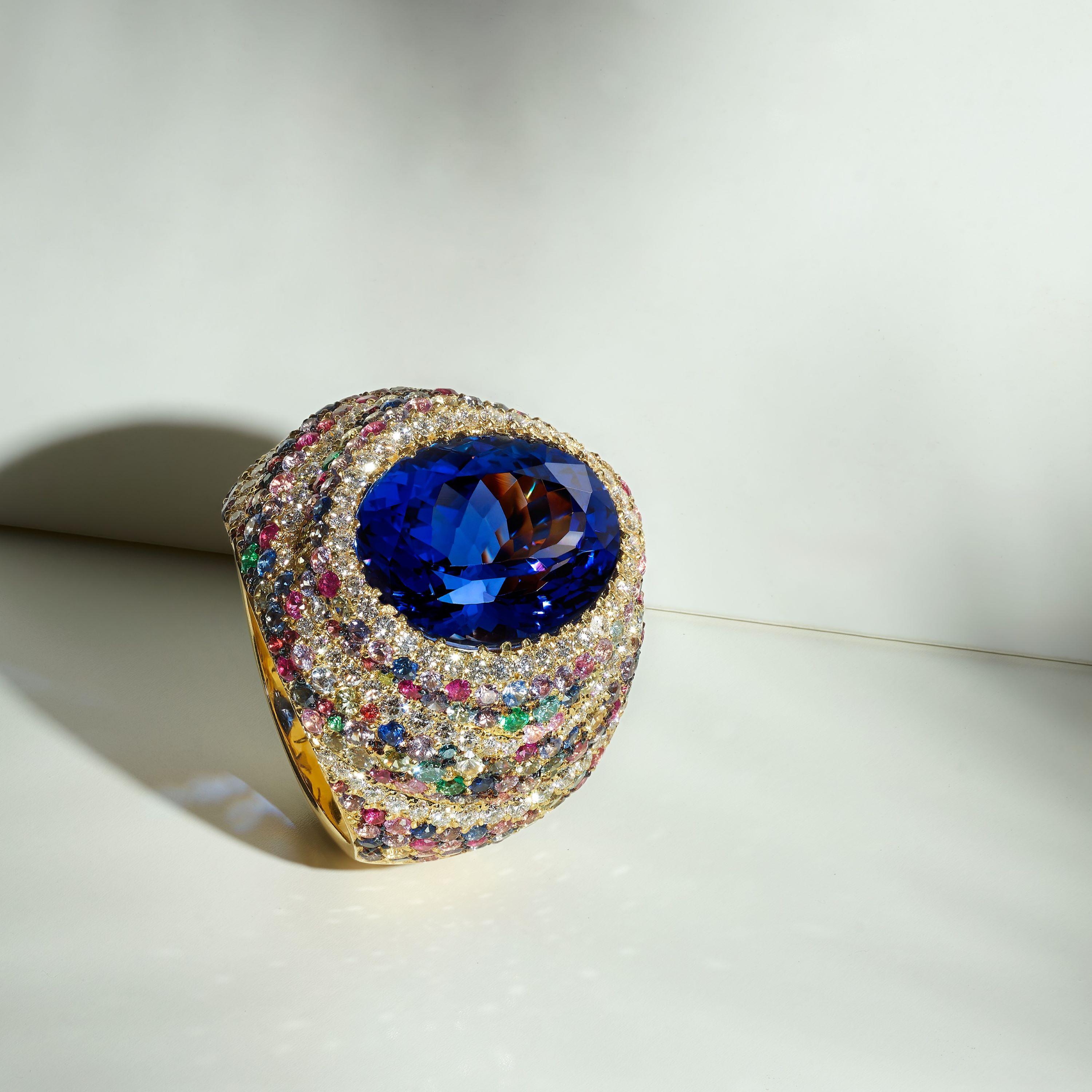 Contemporary GIA certified Tanzanite, Diamond, Sapphire and Emerald Cocktail Ring  For Sale