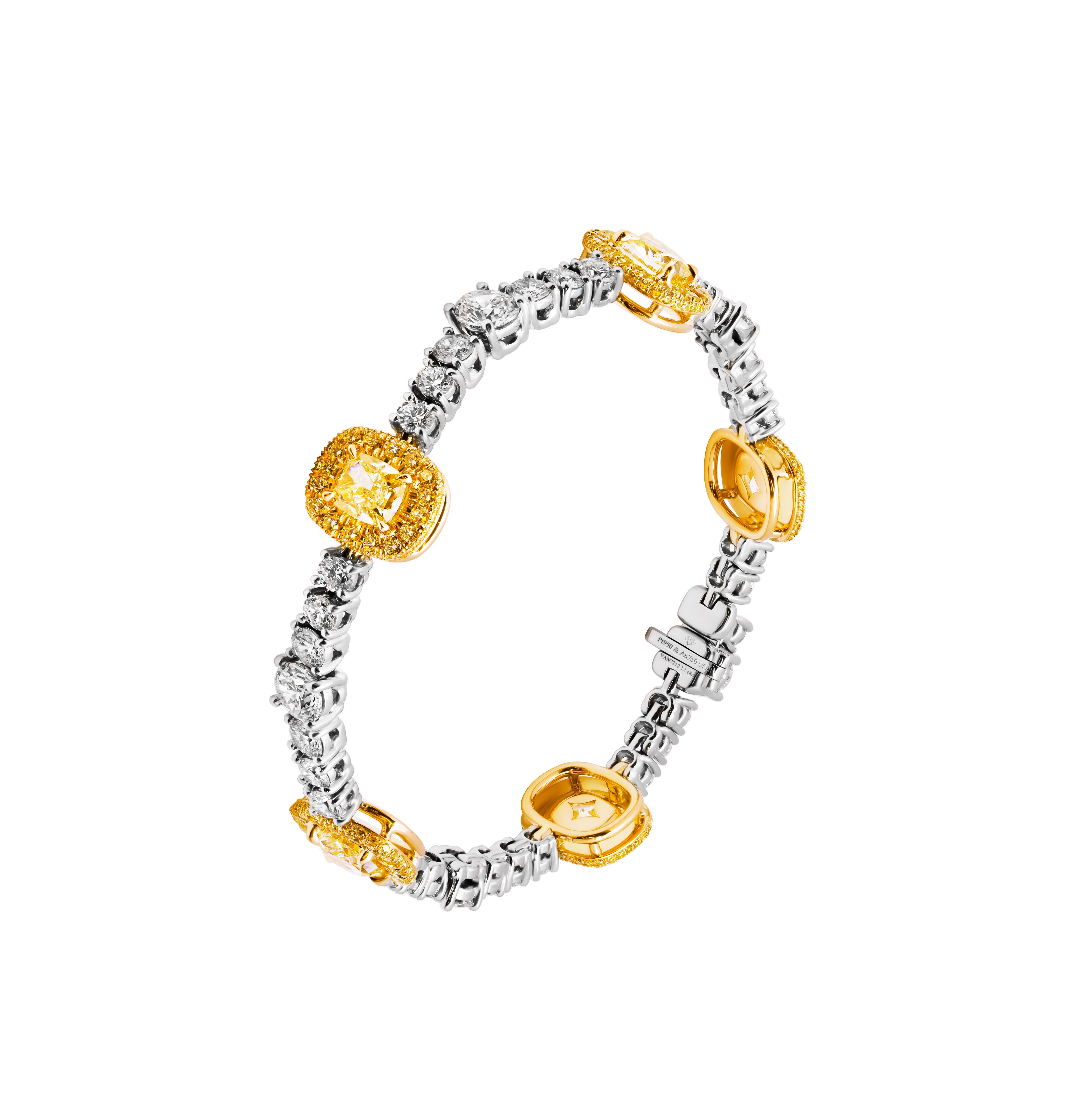 Immerse yourself in the opulence and elegance of this extraordinary GIA Certified Tennis Bracelet, meticulously crafted in a luxurious blend of 950 platinum and 18K yellow gold. This stunning piece showcases an exquisite array of fancy yellow