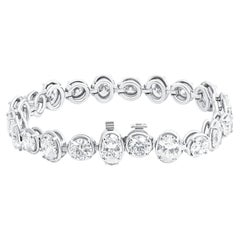 Bracciale da tennis certificato GIA con diamanti ovali e rotondi