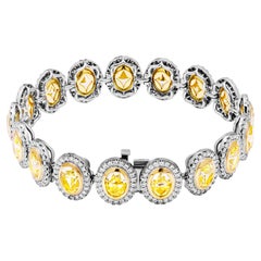 Bracciale Tennis certificato GIA con diamanti ovali gialli