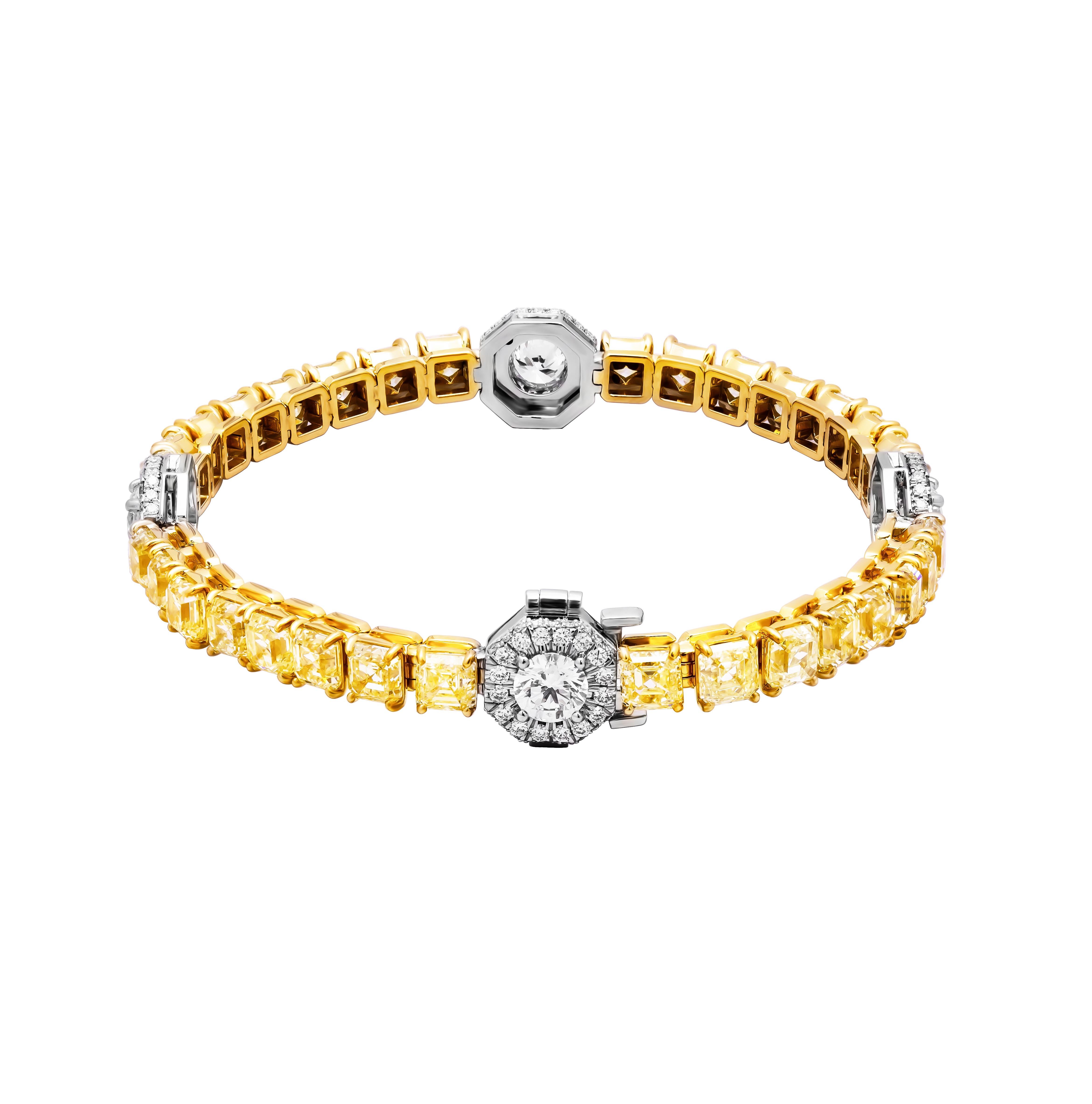 ndulge in the epitome of luxury and sophistication with this breathtaking tennis bracelet, meticulously crafted in a fusion of 18K yellow gold and 950 platinum. Adorned with a mesmerizing array of Asscher-cut fancy yellow diamonds and round white