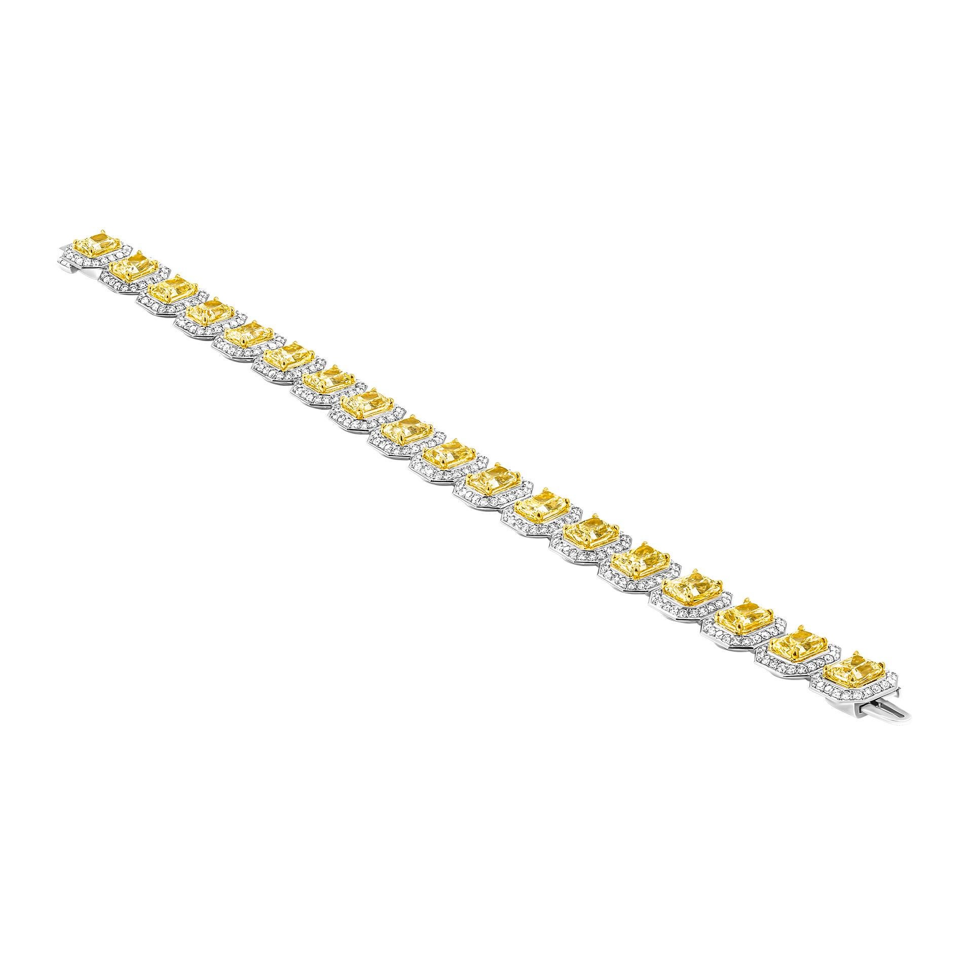 GIA Certified Tennis bracelet in 18k Yellow Gold &Platinum
With white diamond pave totaling 3.39ct
18 stones Radiant cut diamond 
Total Carat Weight: 19.39ct
All stones are GIA Certified :
1.00ct U to V VS1 GIA#6452740770
1.00ct Y to Z VS1