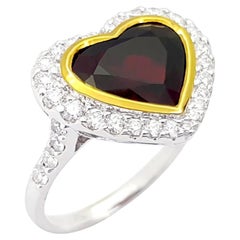 Anello con diamante e rubino thailandese a forma di cuore certificato GIA e incastonato in oro bianco 18 carati