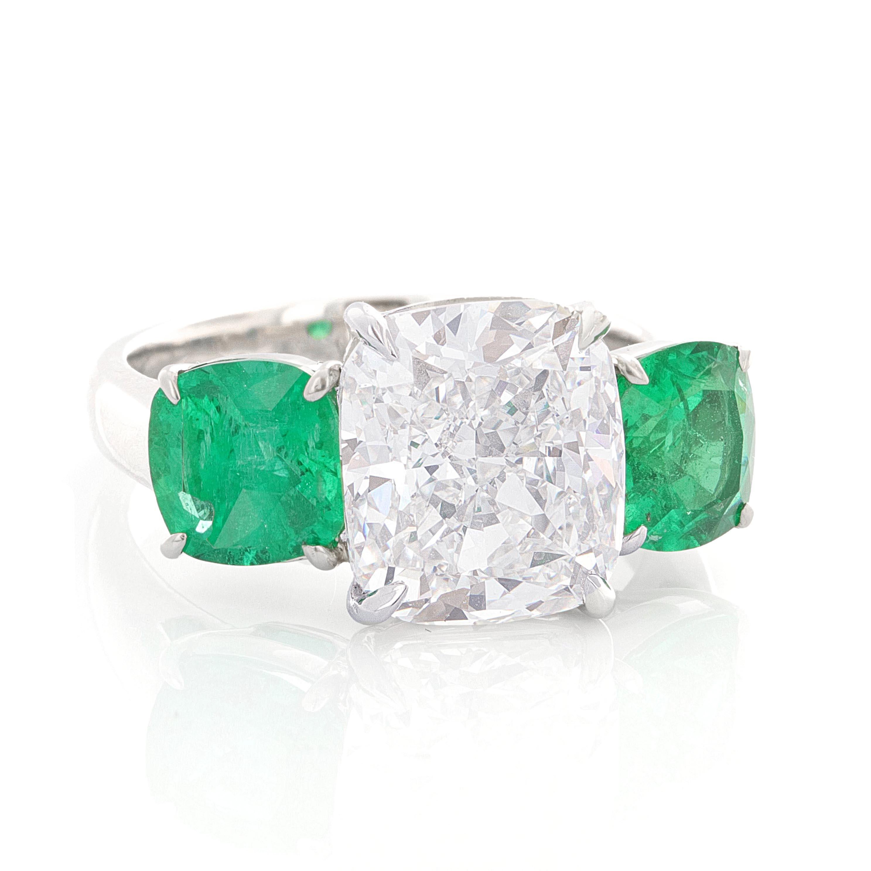 three stone emerald and diamond ring