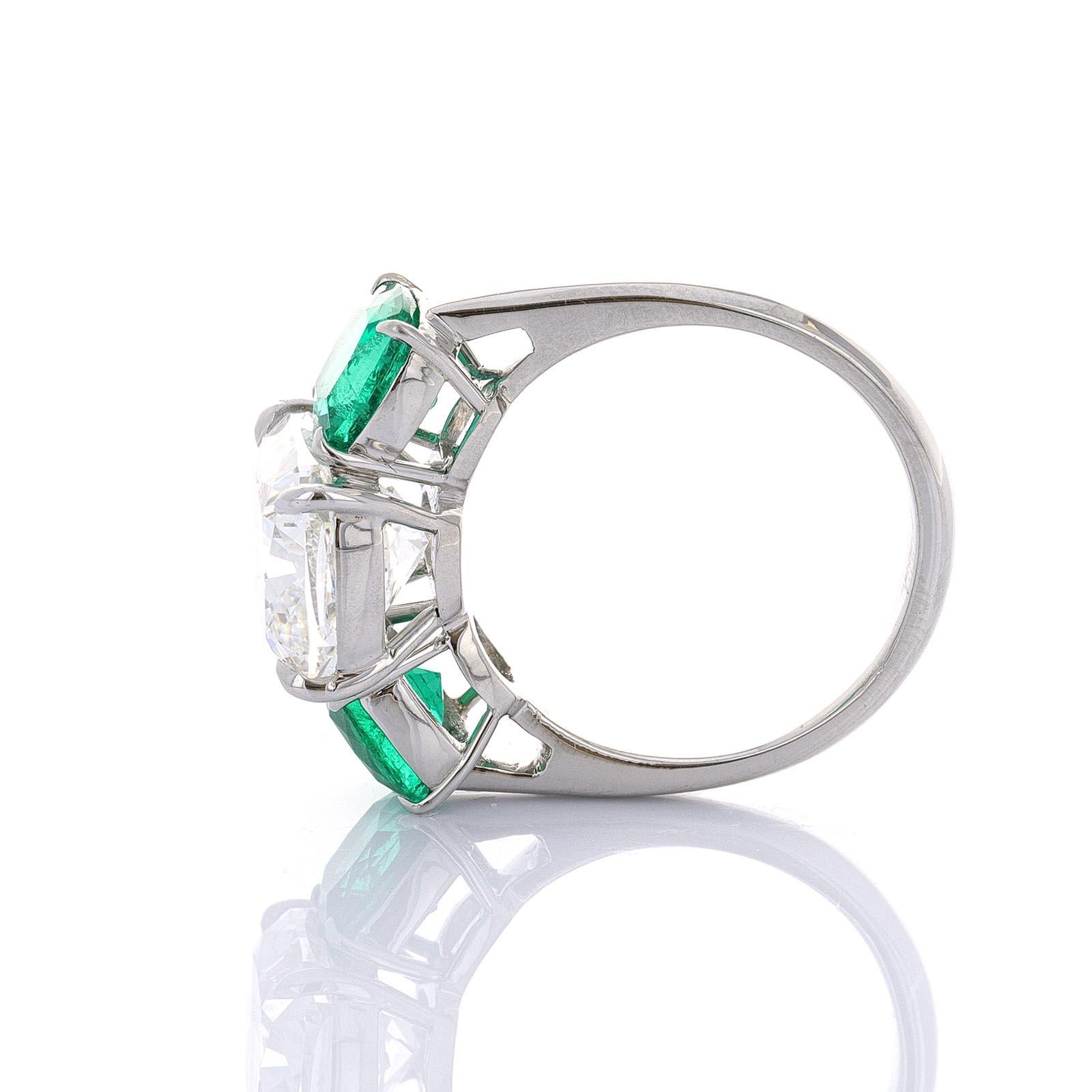 diamond ring with emerald side stones