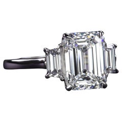 GIA Certified Three Stone Emerald Cut Diamond Ring G Color VVS2 Clarity